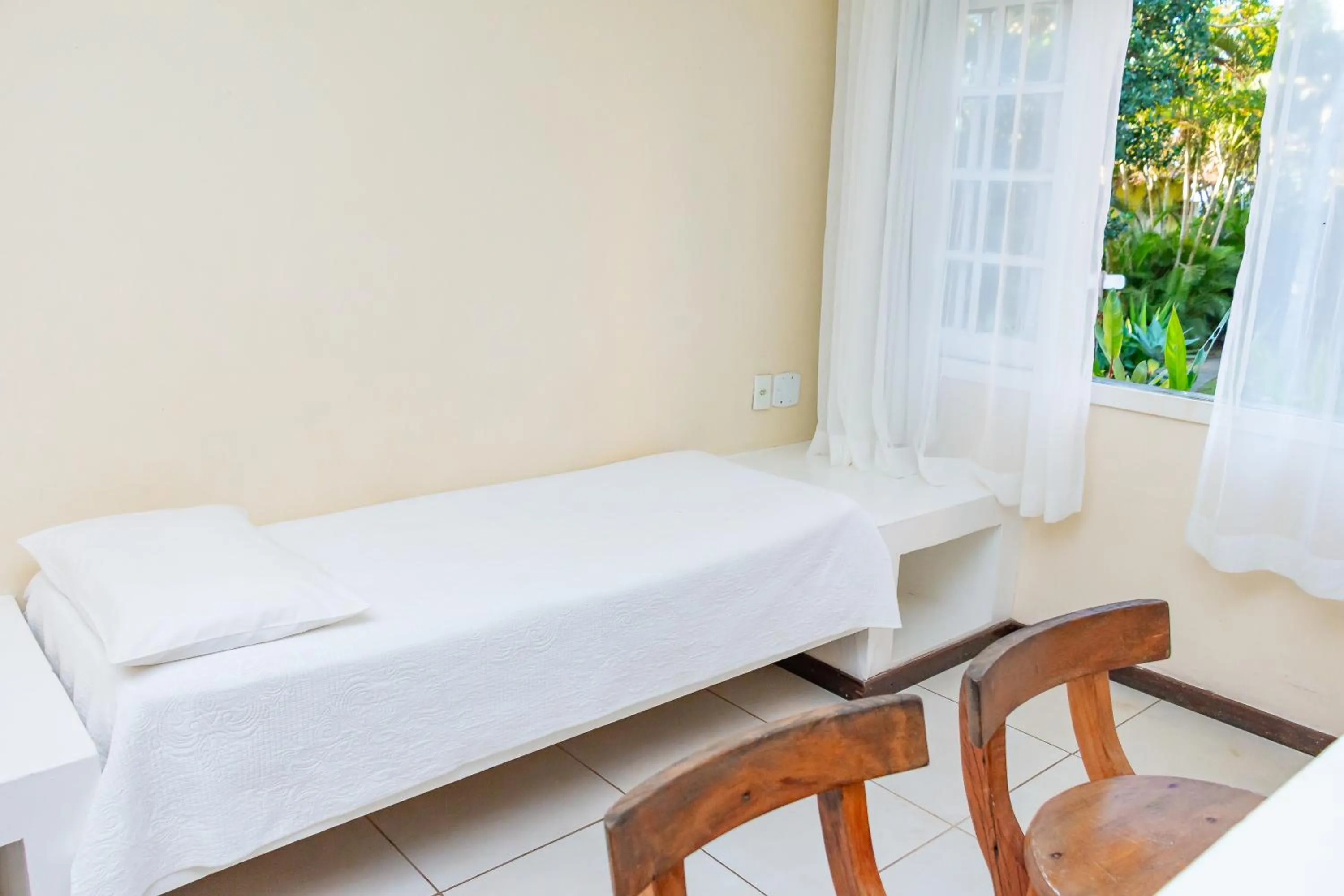 Bed in Pousada dos Reis