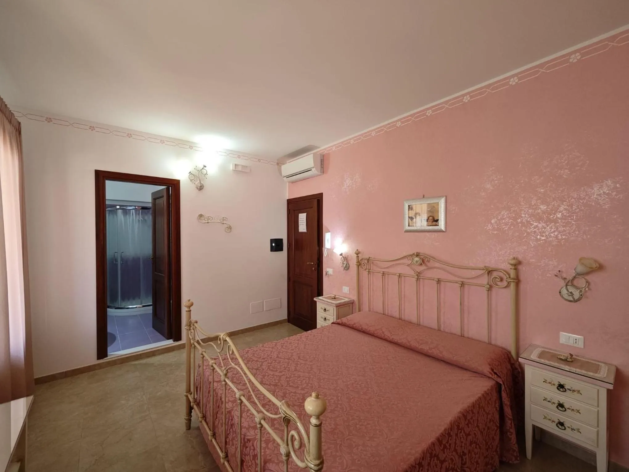 Bedroom in B&B Orchidea