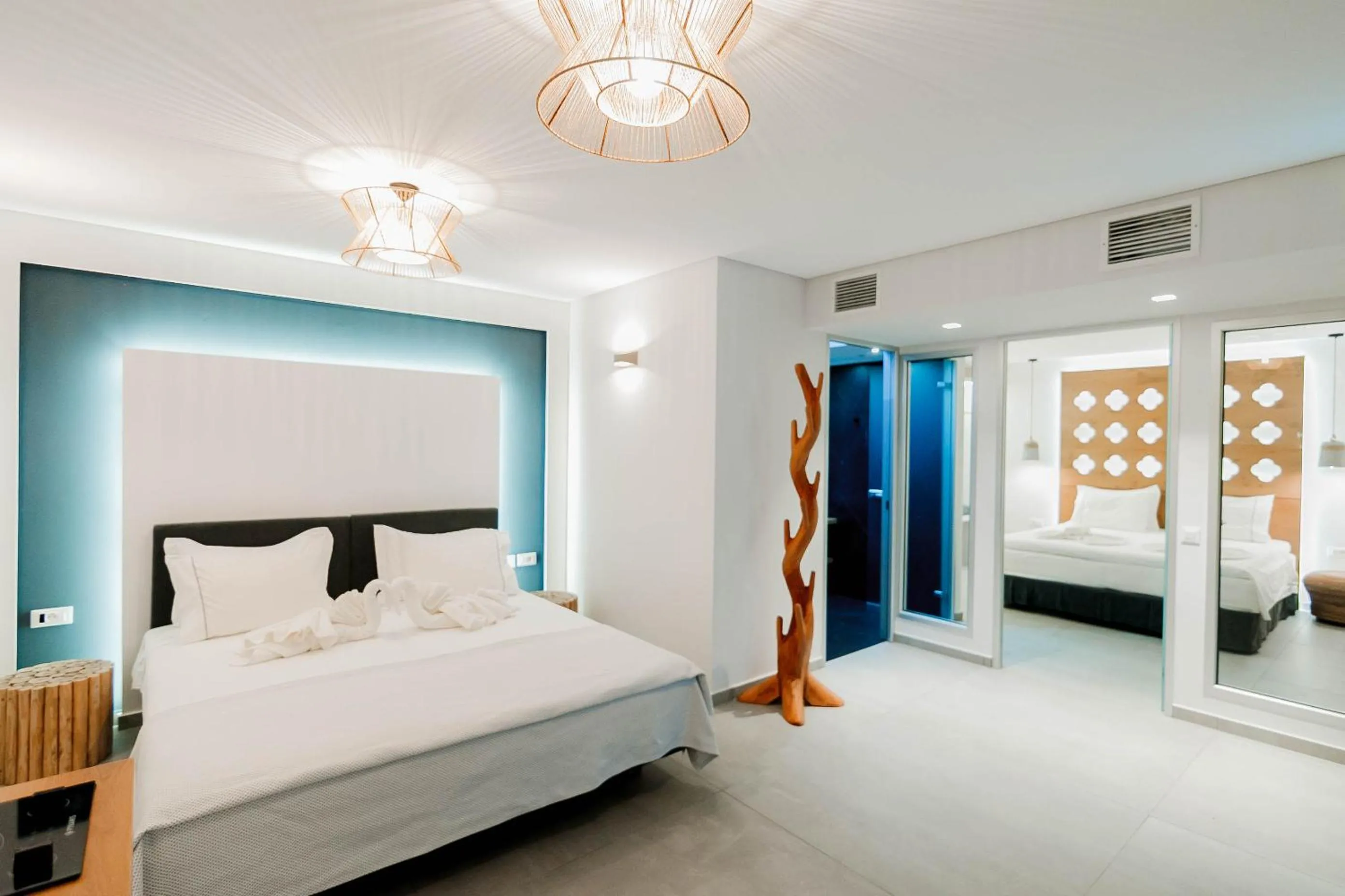 Bed in Golden Bay Suites & Maisonettes