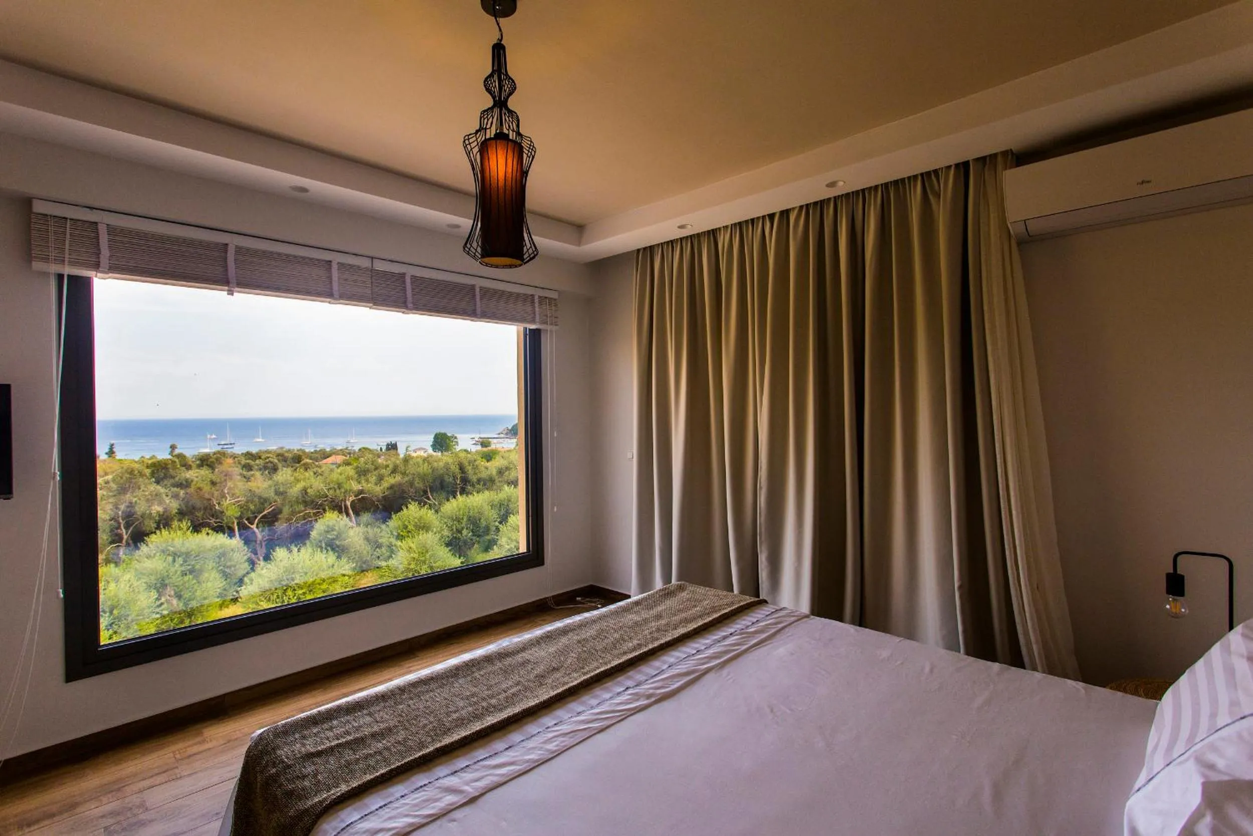 Bed in Golden Bay Suites & Maisonettes