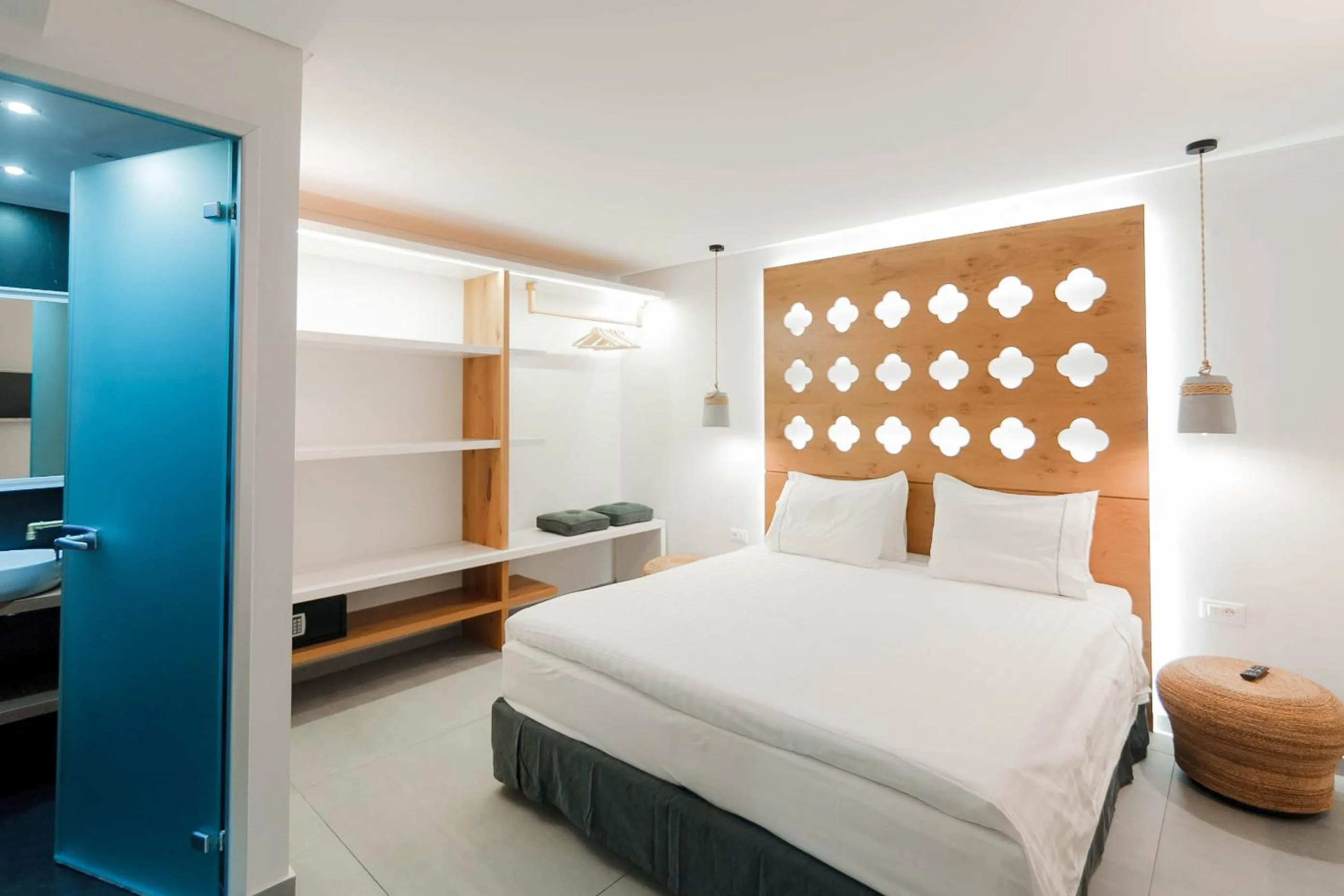 Bed in Golden Bay Suites & Maisonettes