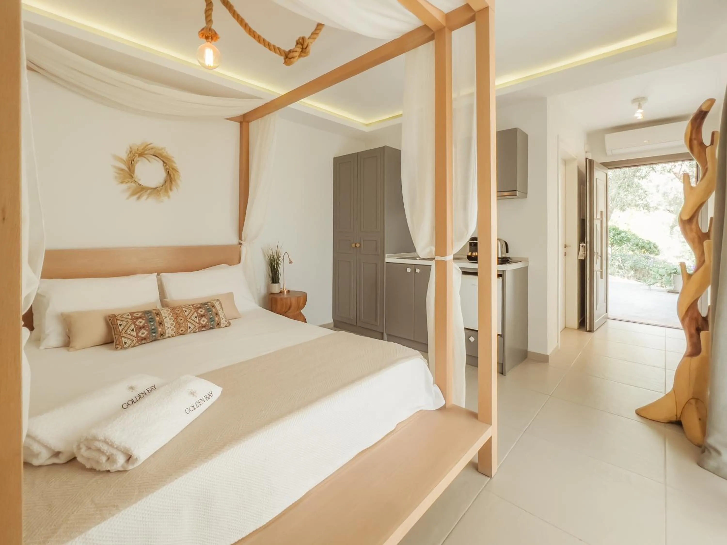 Bed in Golden Bay Suites & Maisonettes