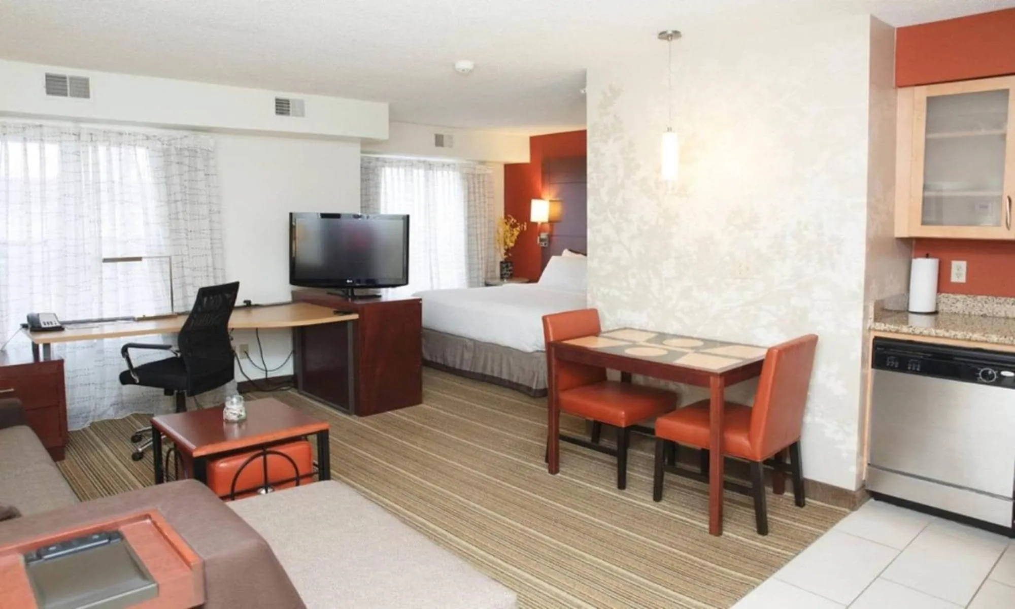 Bedroom in MainStay Suites Appleton Airport - Fox River Mall Area