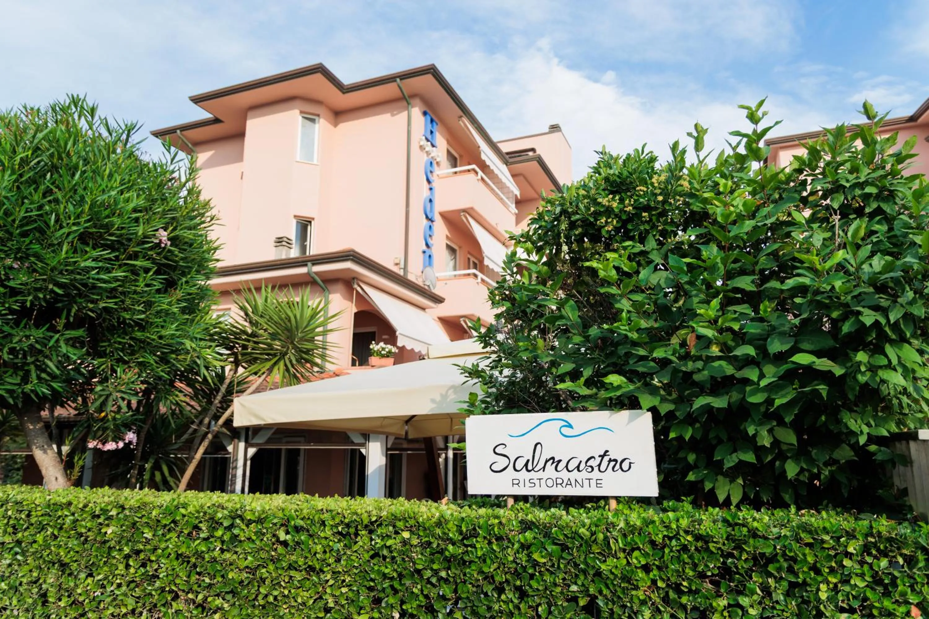 Property logo or sign in Hotel Eden