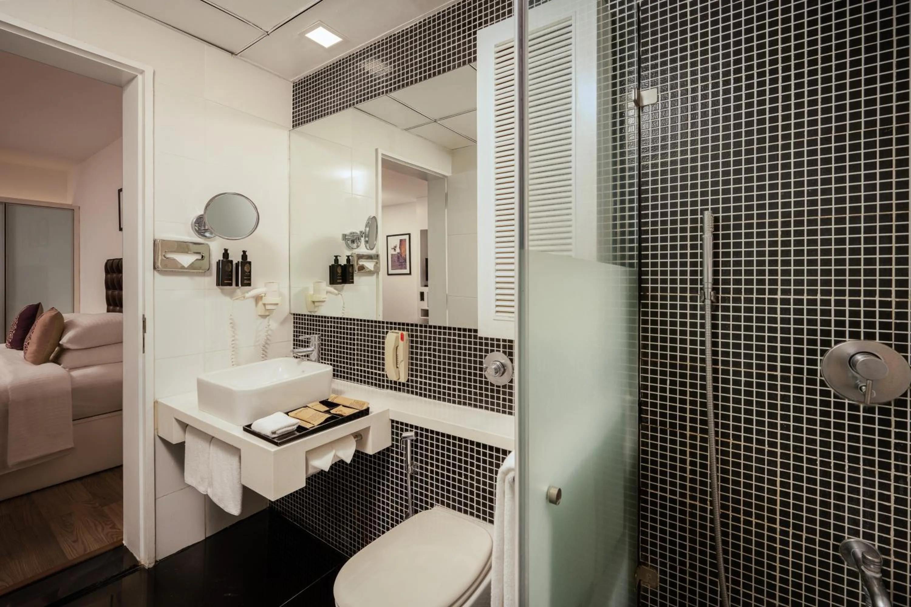 Bathroom, Bed in Grand Mercure Bangalore - An Accor Brand