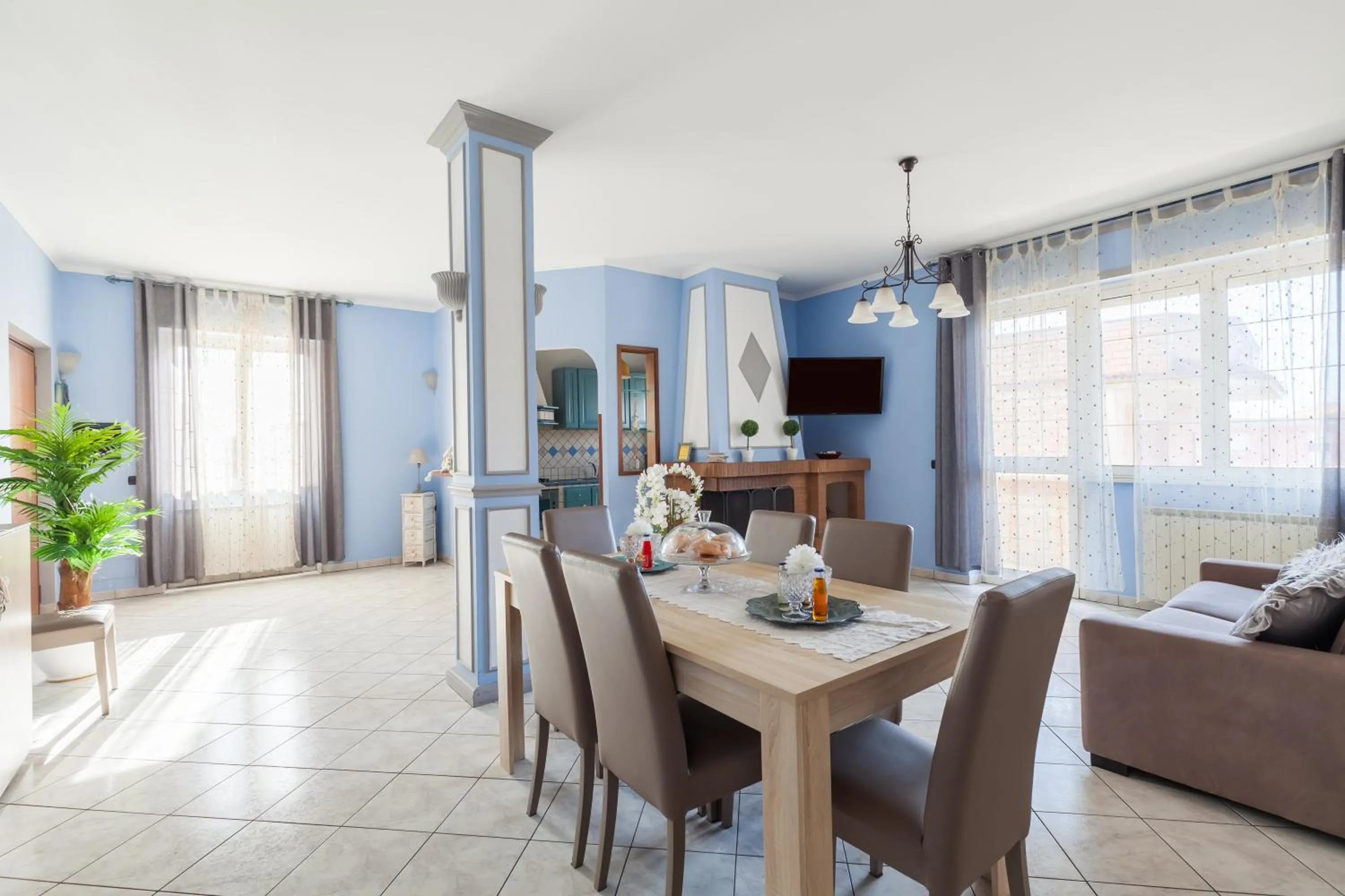 Communal lounge/ TV room in Casa Vacanze Giramondo