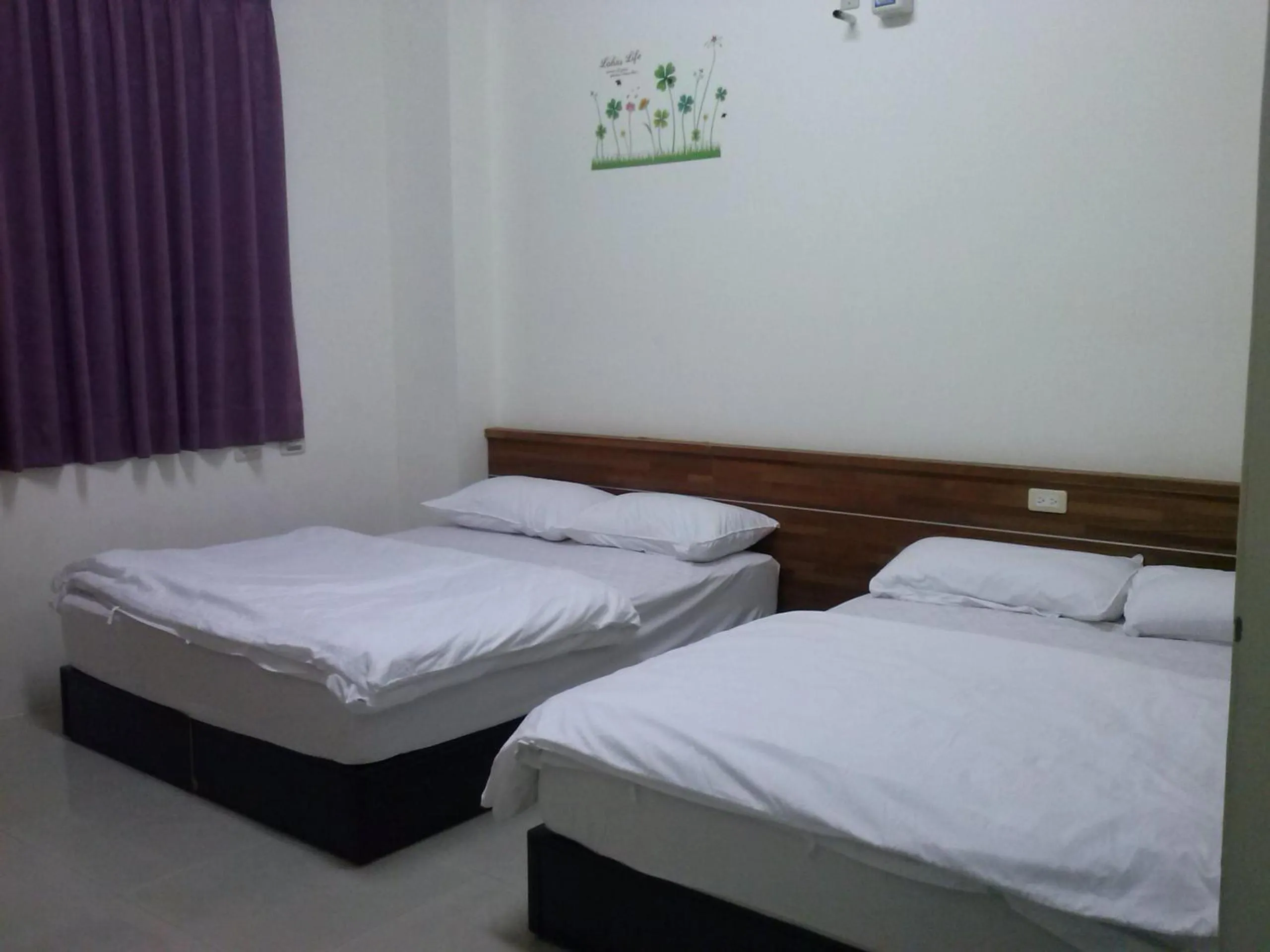 Bed in Lu He Feng Homestay