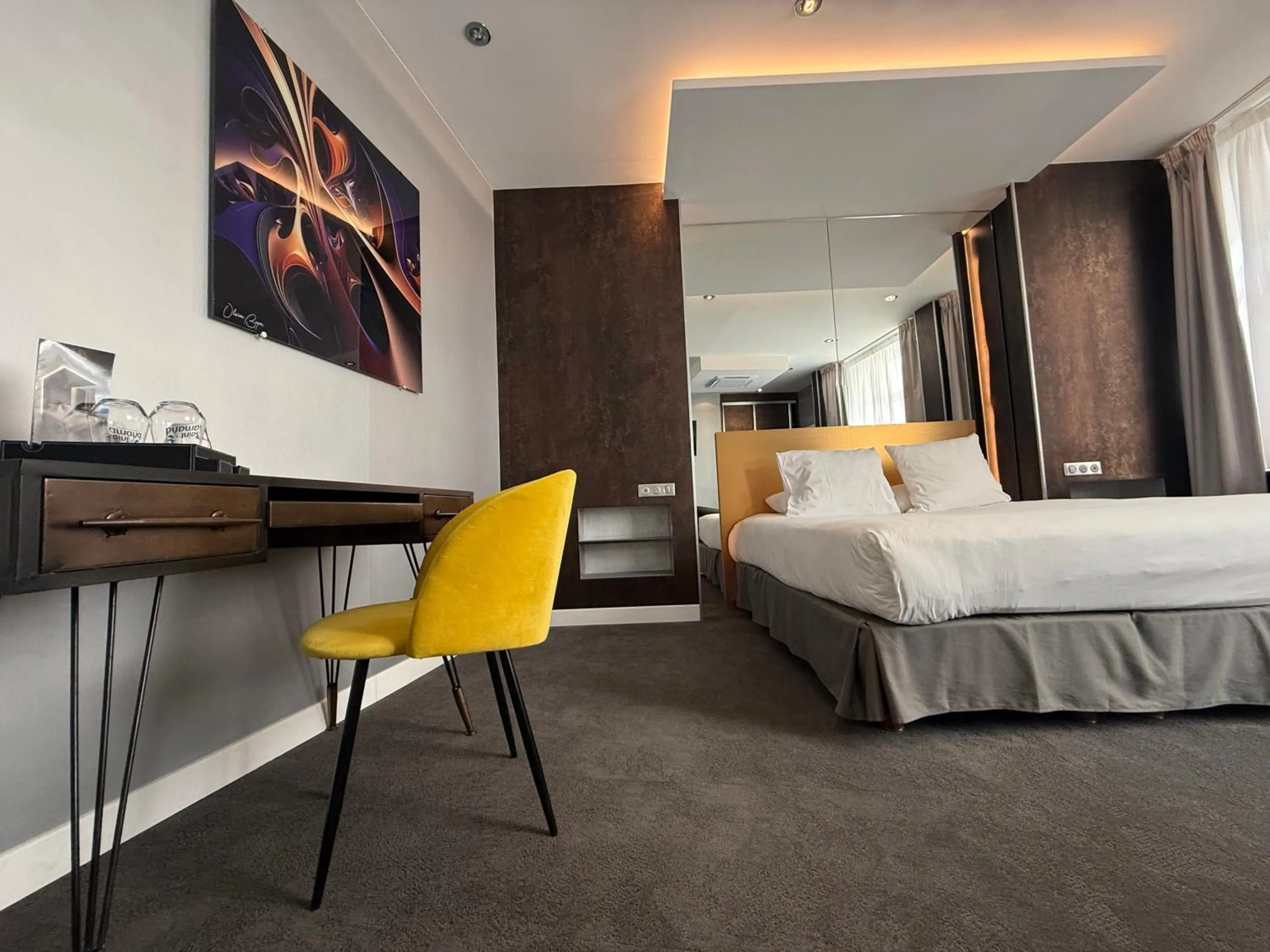 Bed in LOGIS Hôtel Borel