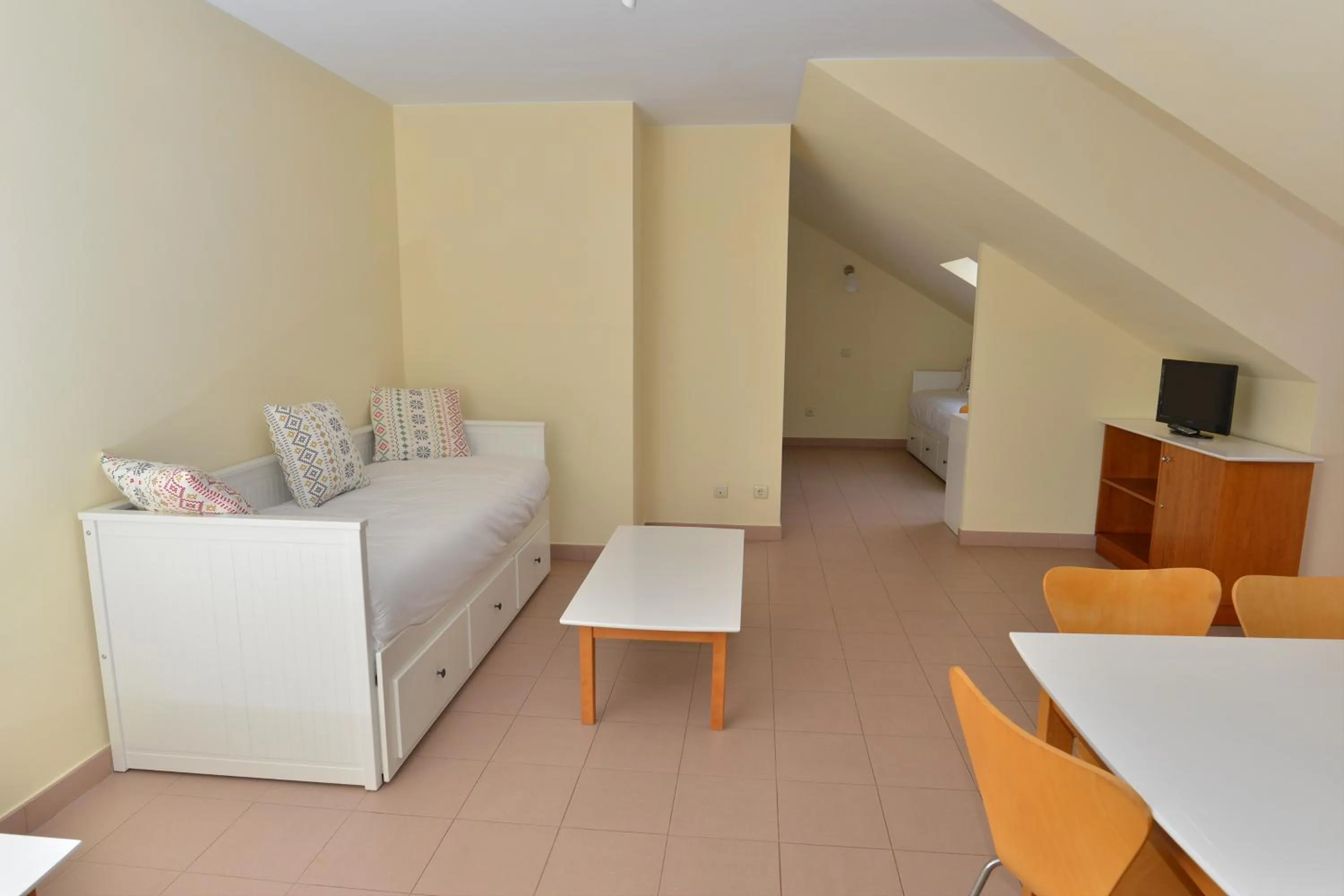 Living room, Bed in Apartamentos Marina