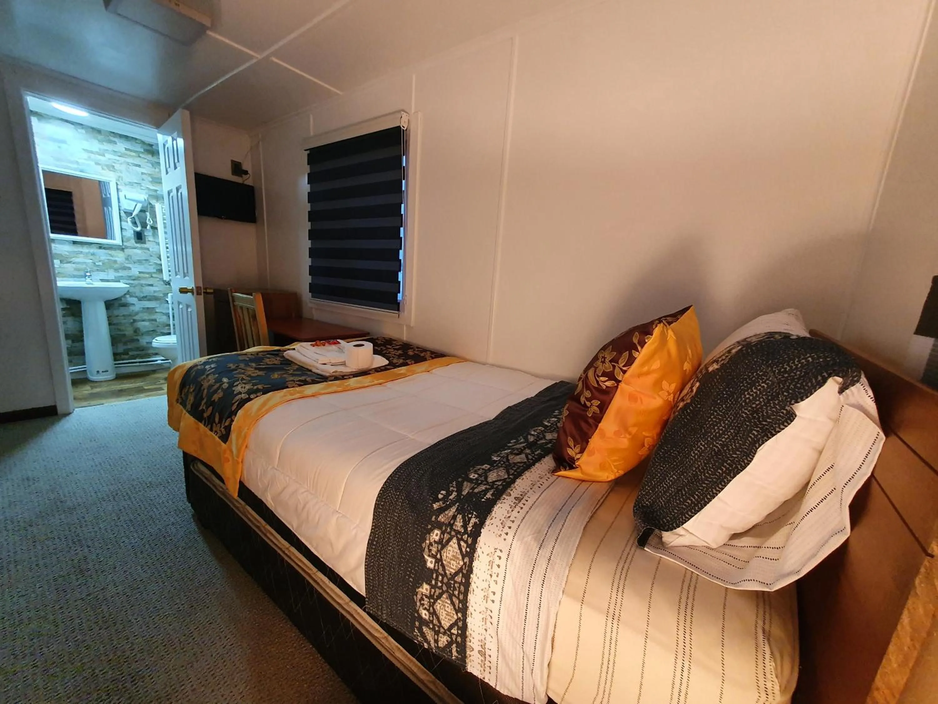 Property building, Bed in Hotel Forjadores del Cabo de Hornos