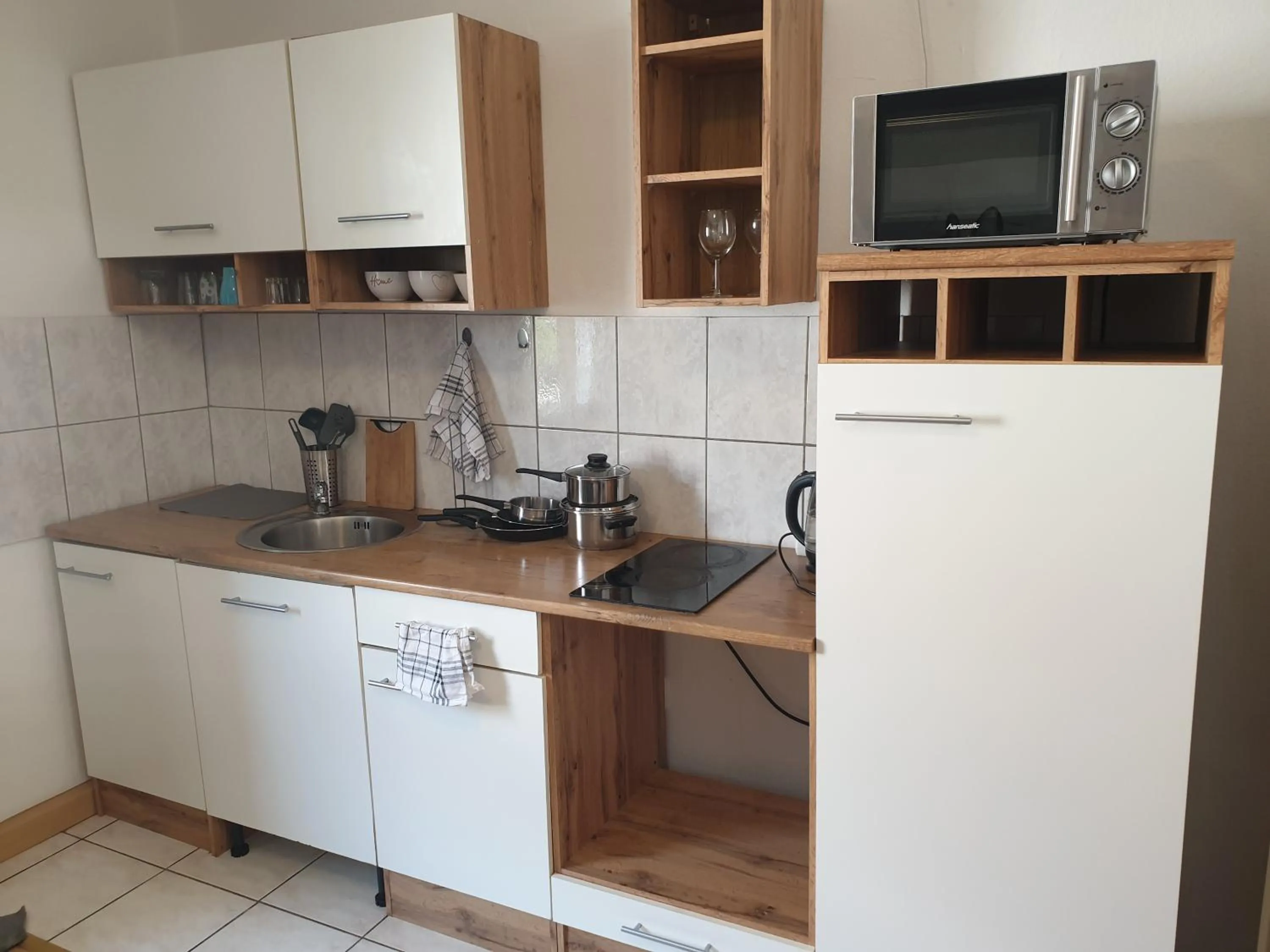 Kitchen or kitchenette in Gästewohnung