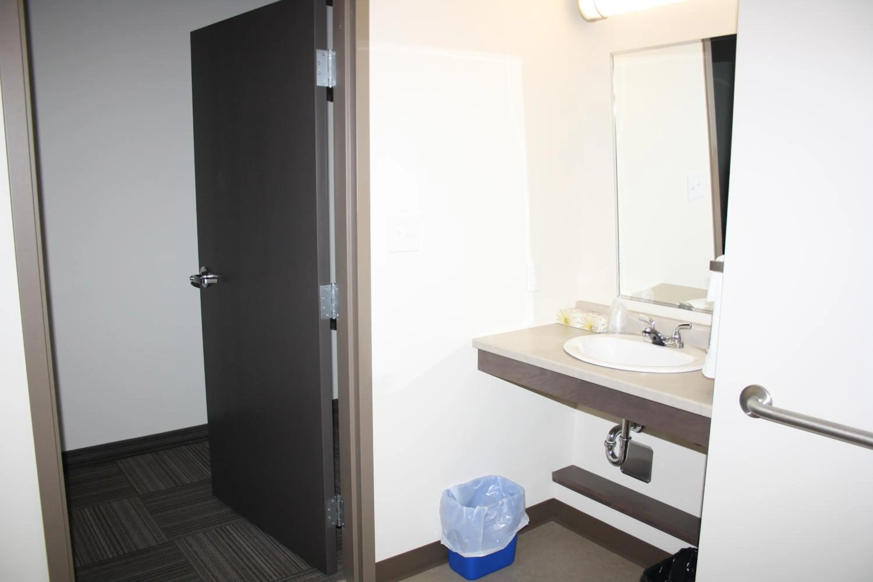 Bathroom in Crossroads Inn & Suites