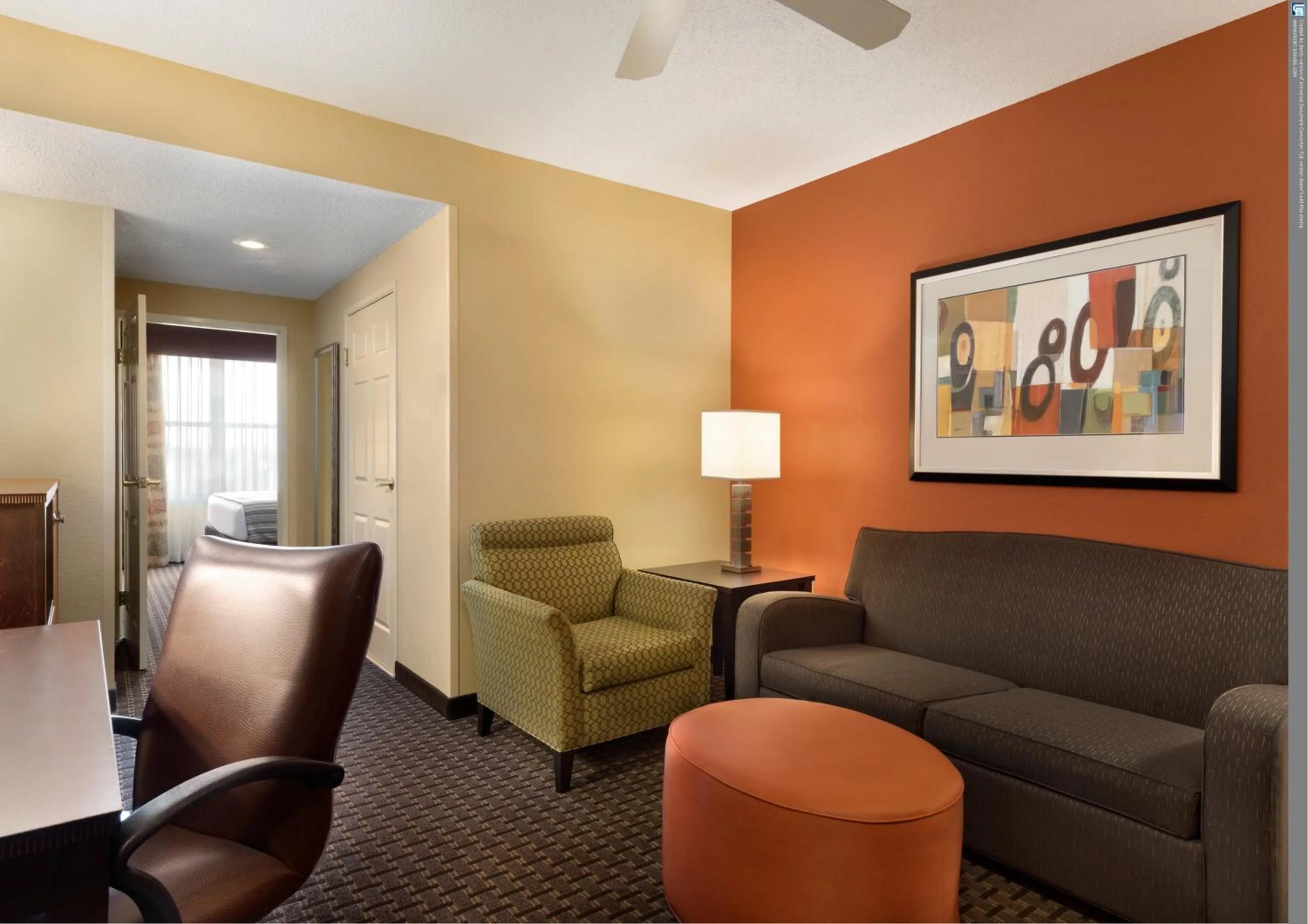 Seating area in Country Inn & Suites by Radisson, Evansville, IN