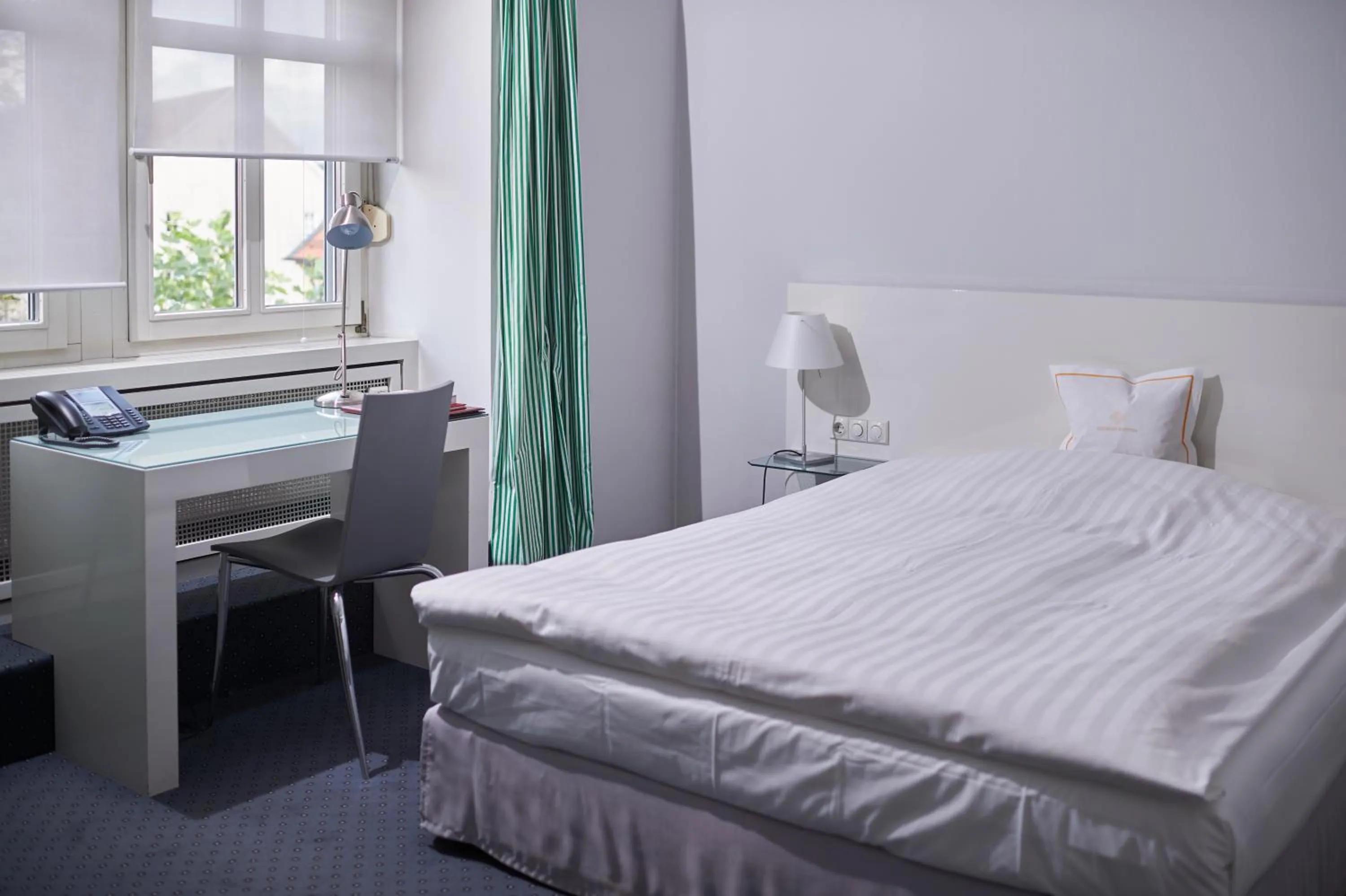 Photo of the whole room, Bed in RomanticHOTEL Goldener Karpfen