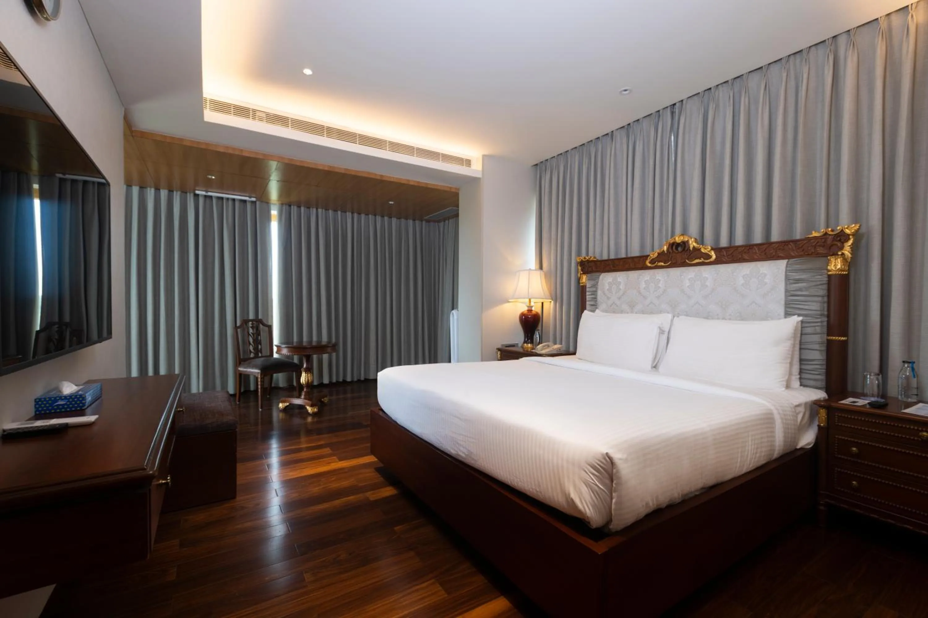 Communal lounge/ TV room, Bed in Novotel Hyderabad Airport