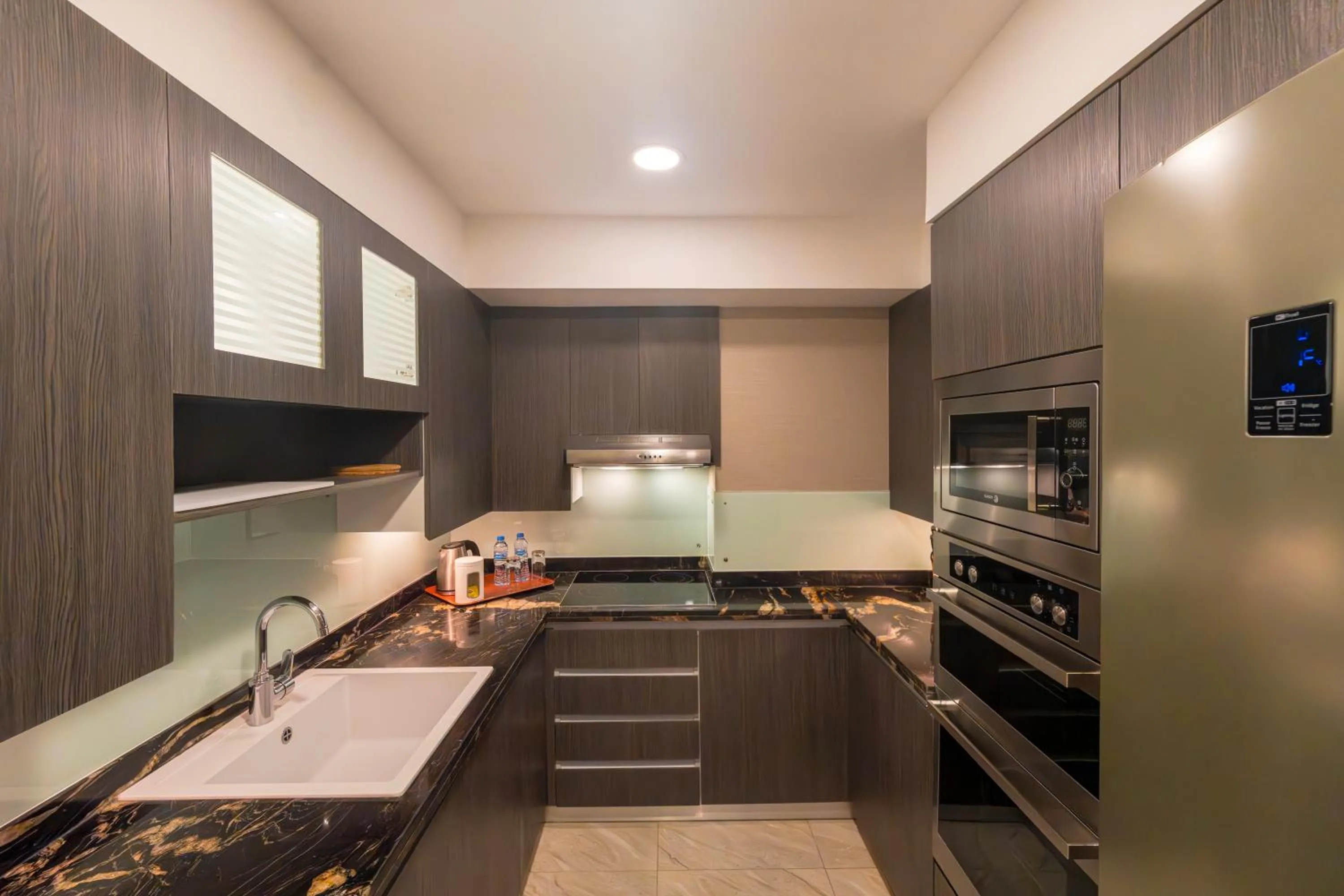 Kitchen or kitchenette in Hyatt Regency Galleria Residence Dubai