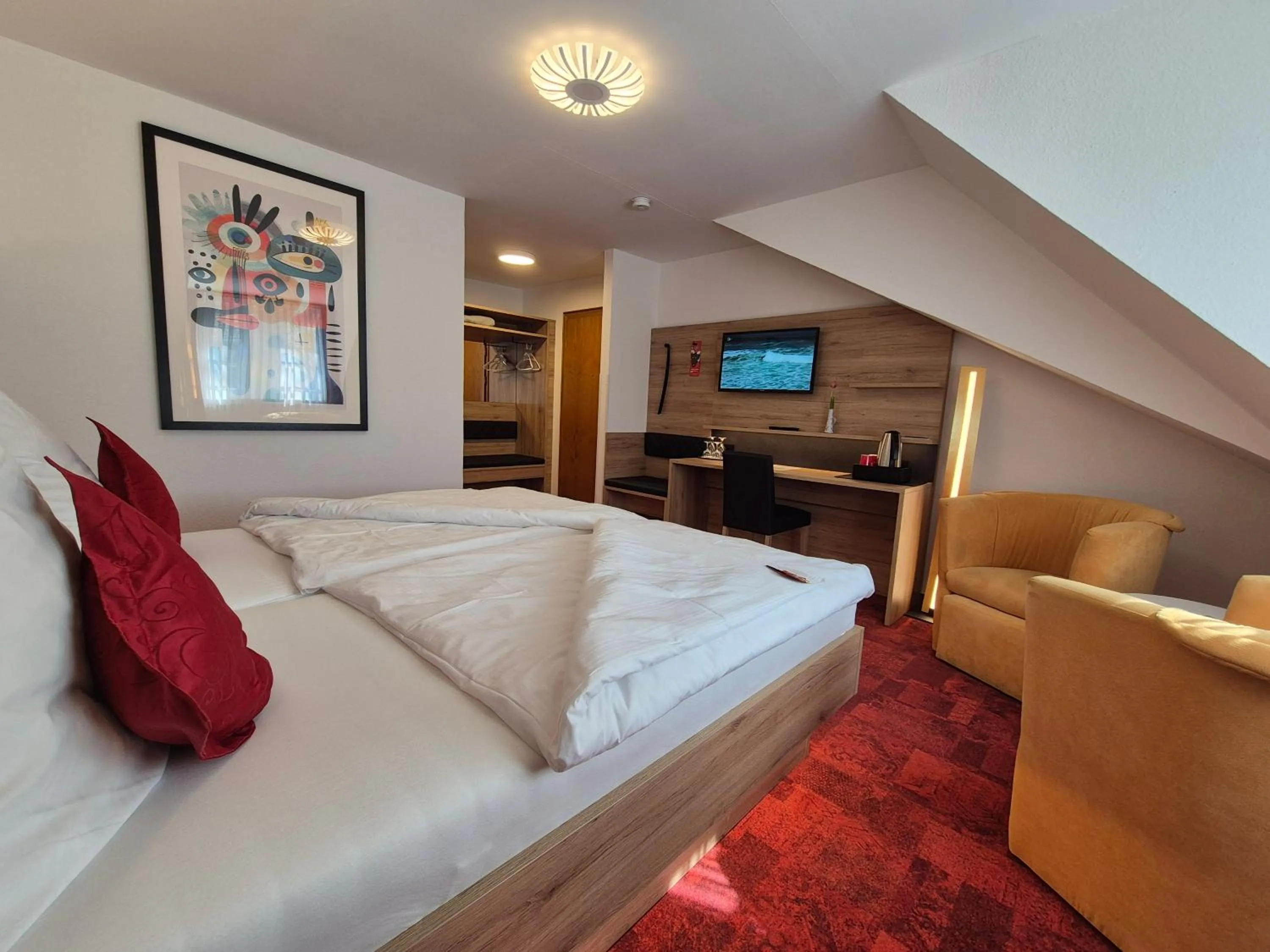 Bed in Hotel St. Georg Garni