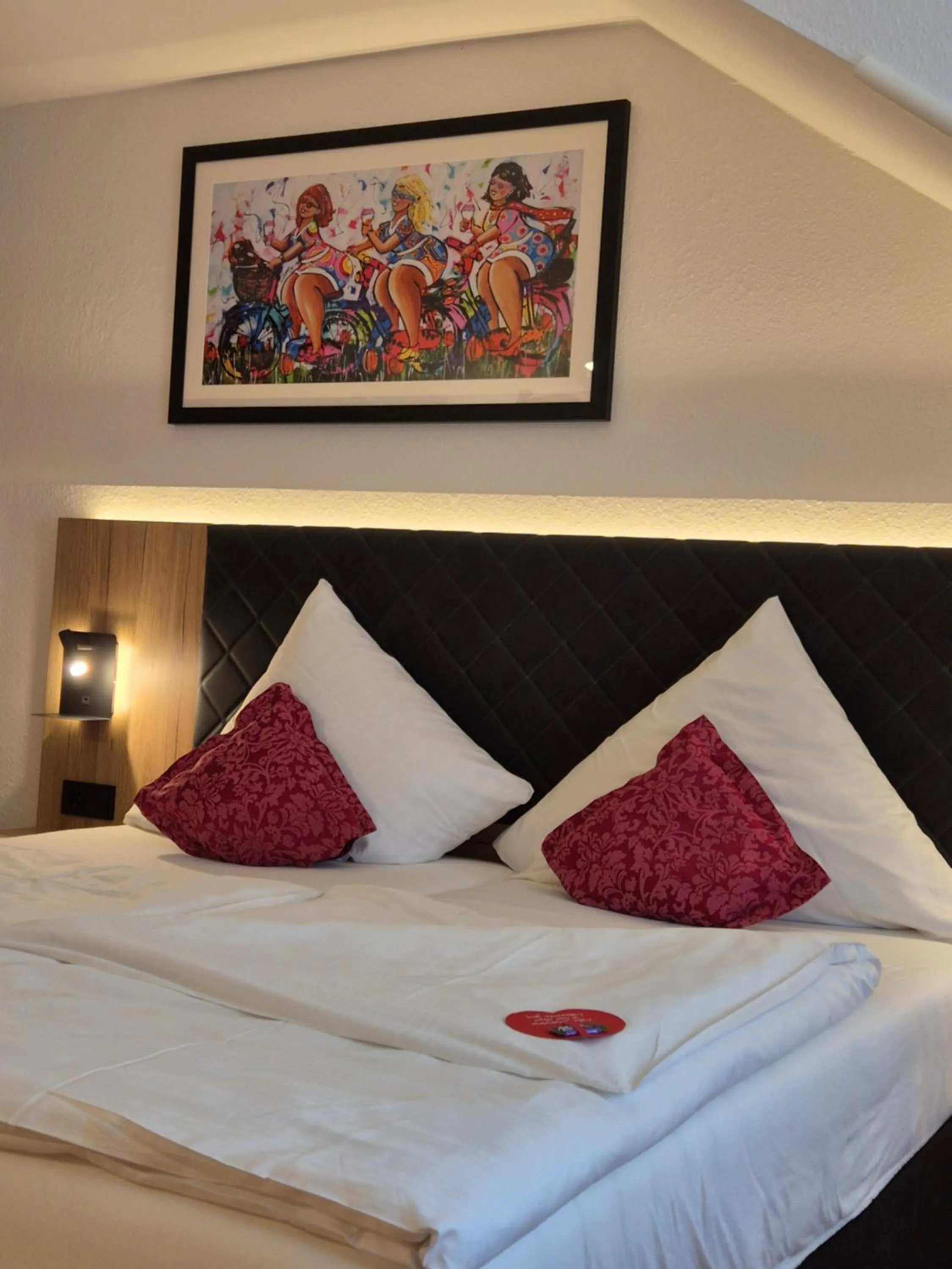 Bed in Hotel St. Georg Garni