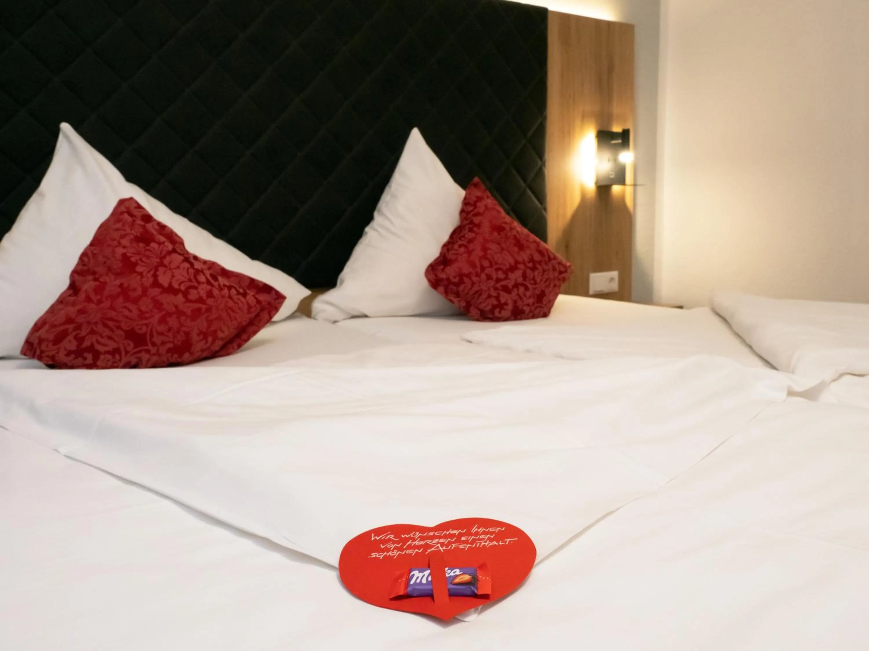 Bed in Hotel St. Georg Garni