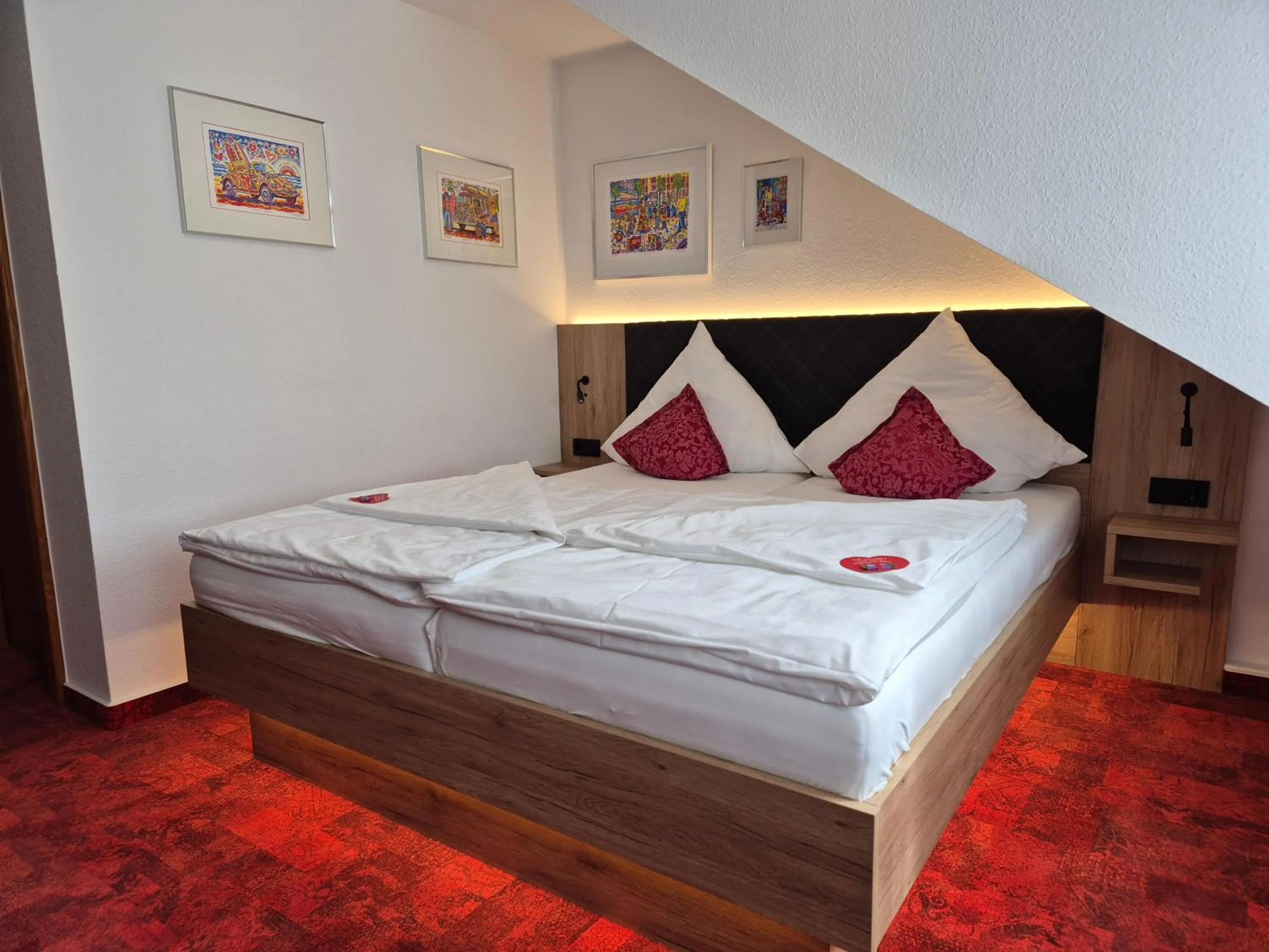 Bed in Hotel St. Georg Garni