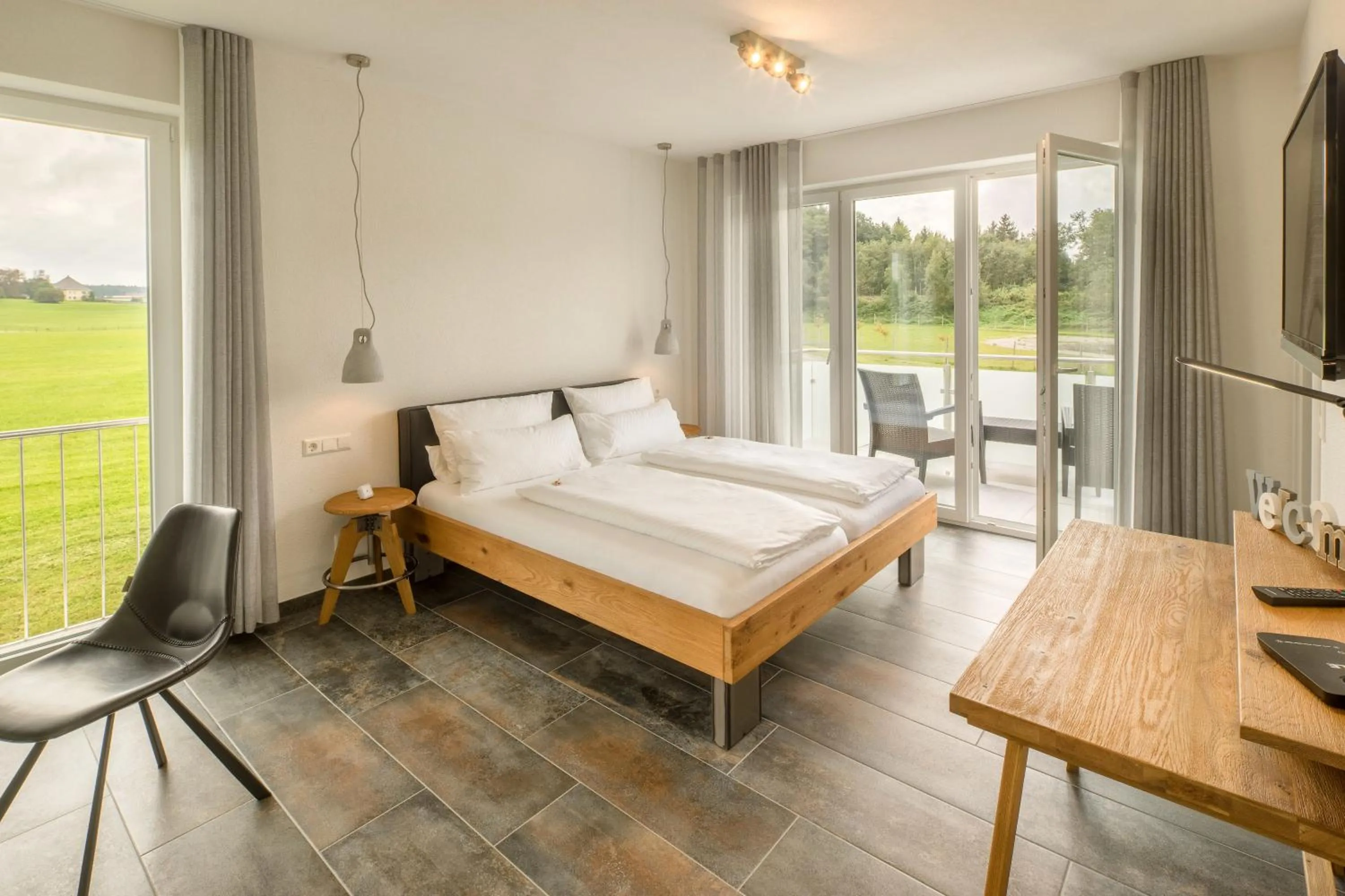 Photo of the whole room, Bed in Hotel Hofgut Tiergarten