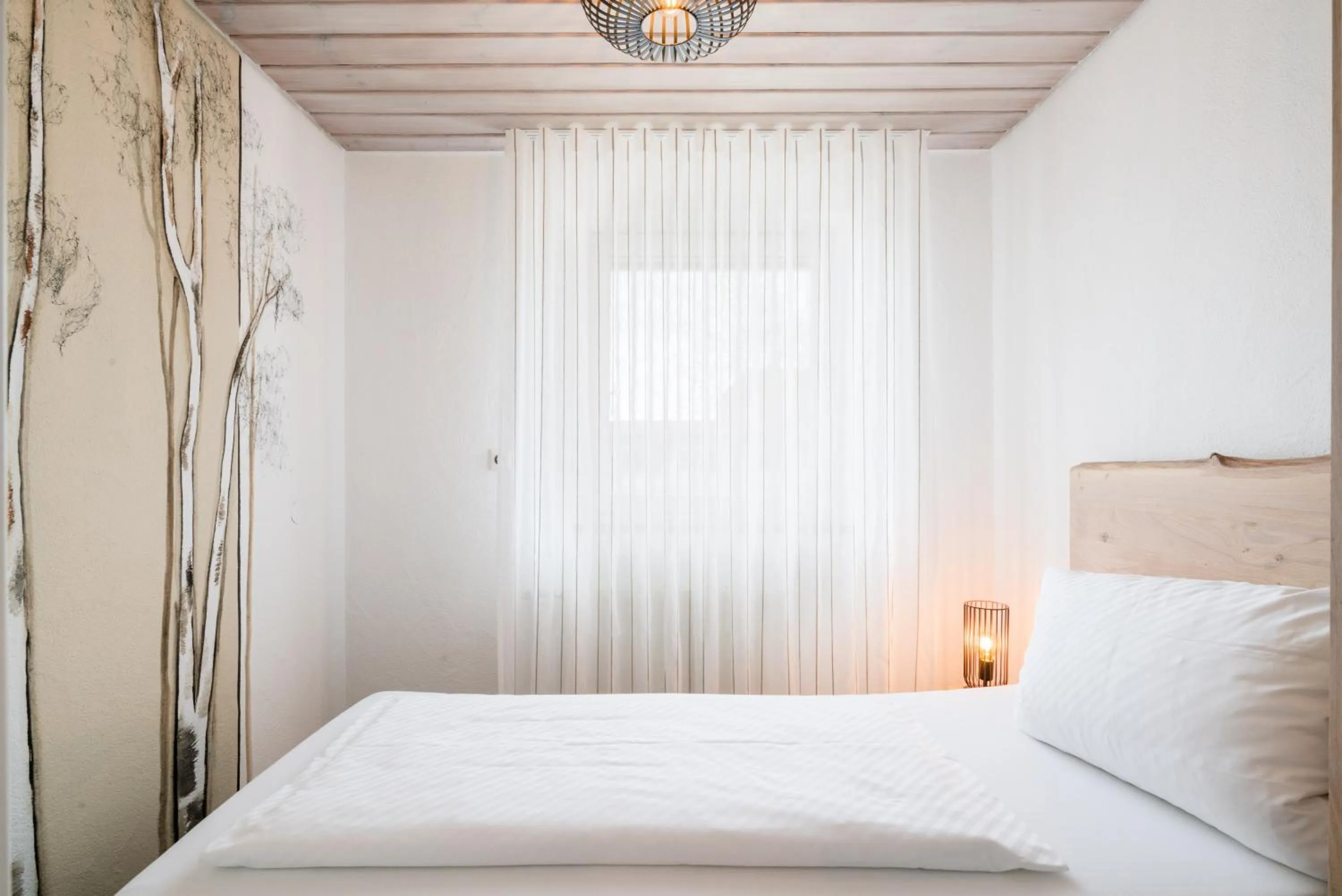 Bed in Hotel Hofgut Tiergarten