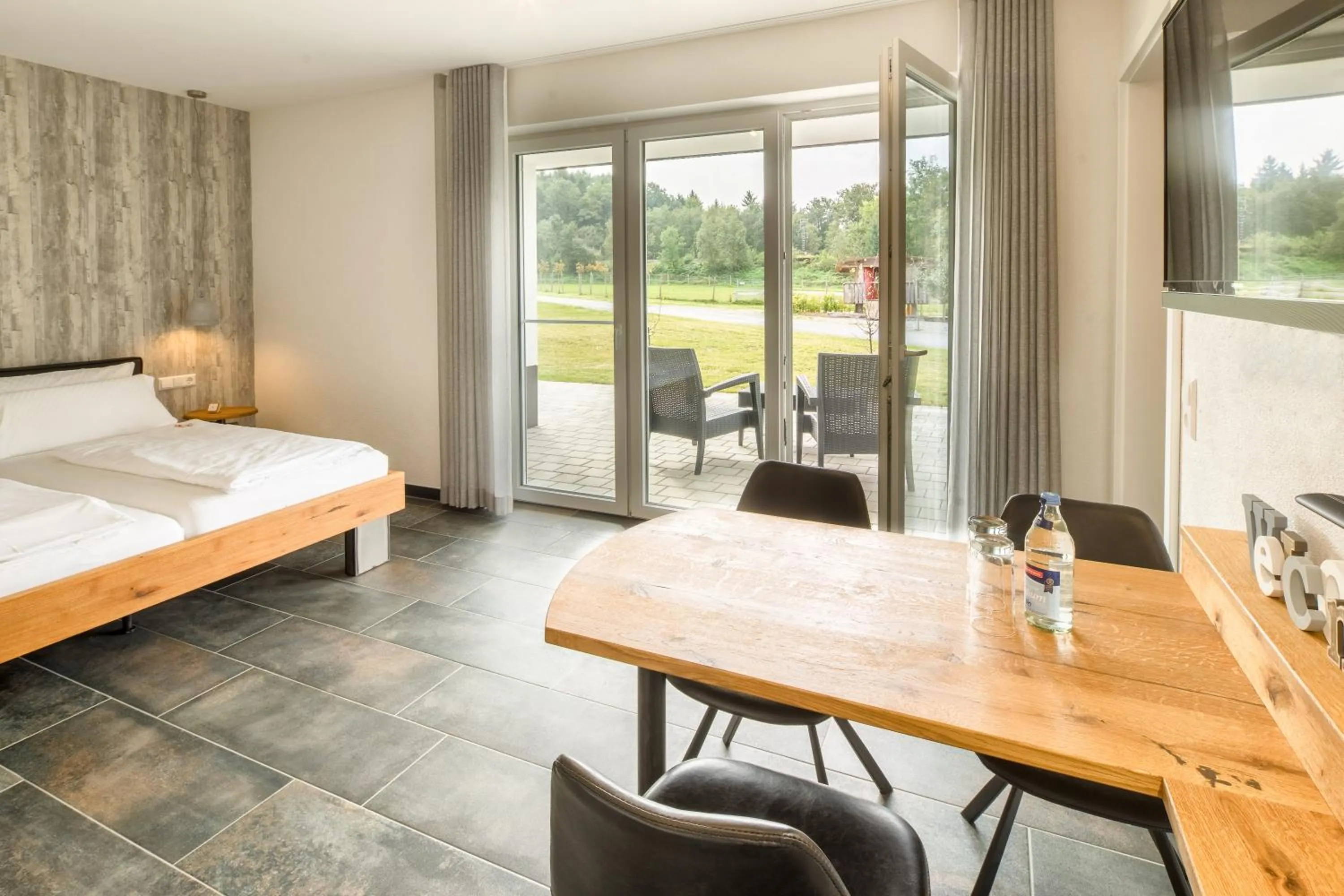 Photo of the whole room, Bed in Hotel Hofgut Tiergarten