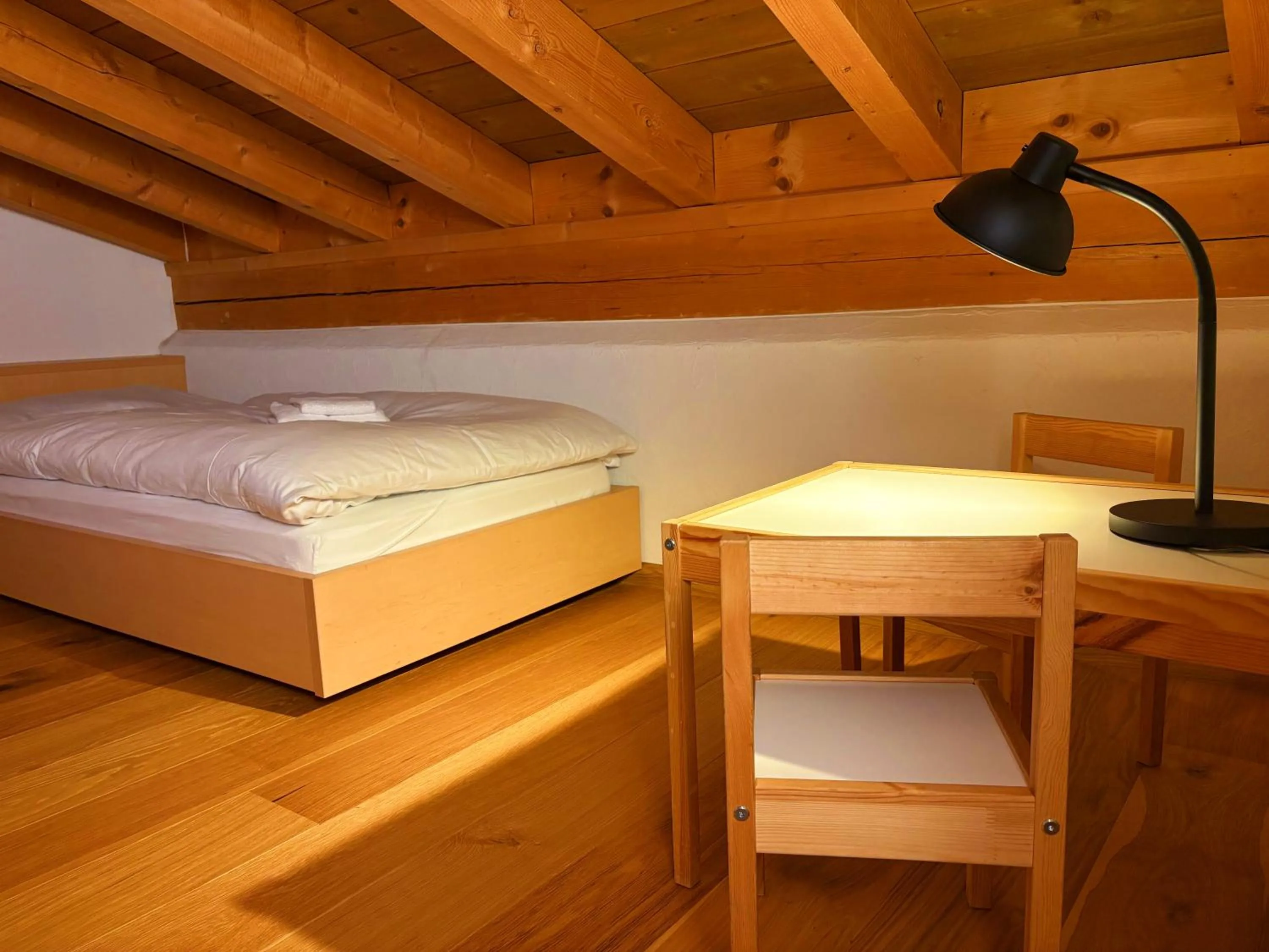 Photo of the whole room, Bed in Madrisa Lodge