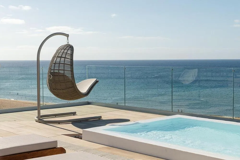 People in Plus Fariones Suite Hotel