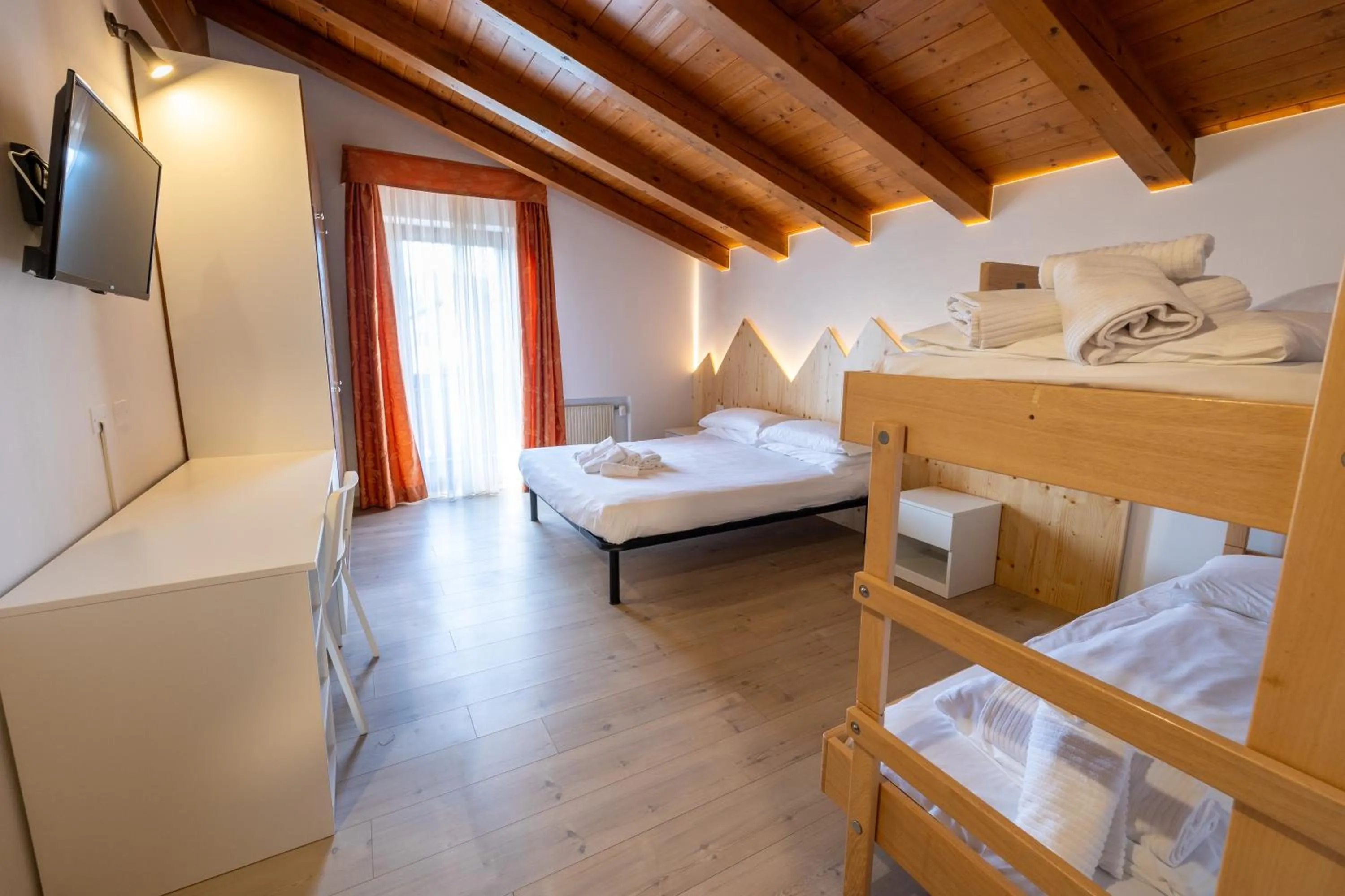 Bed in Hotel Villaggio Nevada