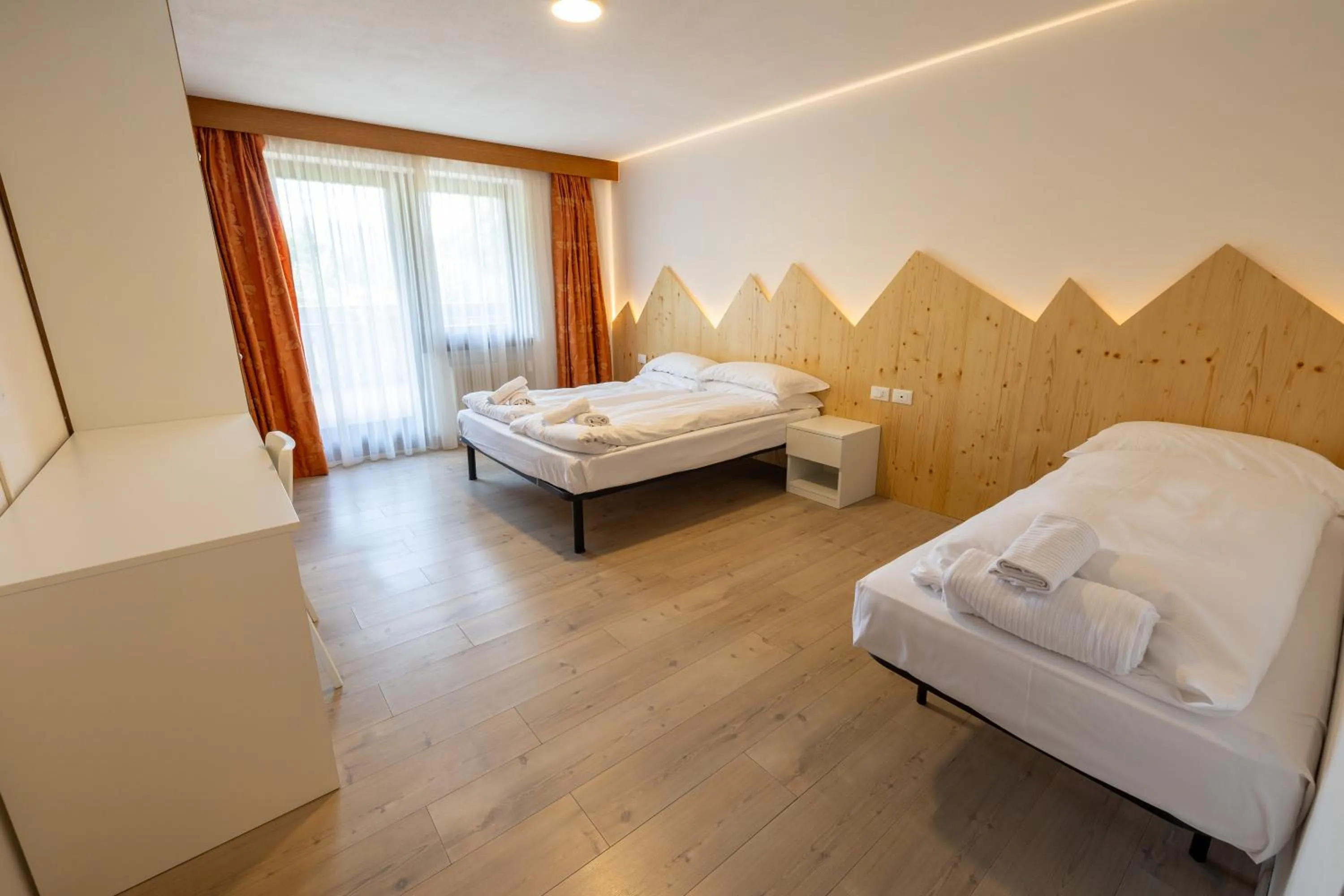 Bed in Hotel Villaggio Nevada