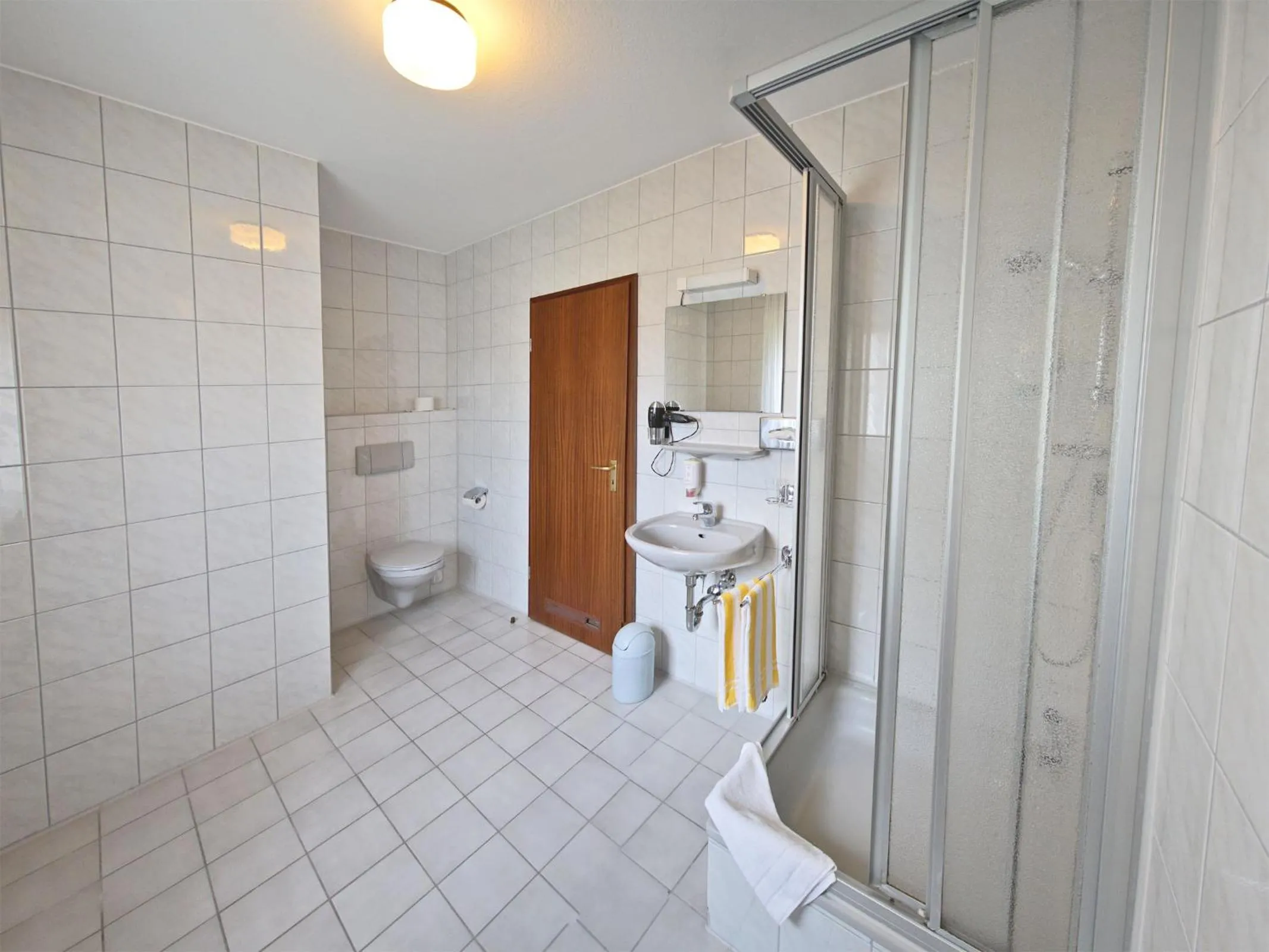 Bathroom in City Hotel Mark Michelstadt