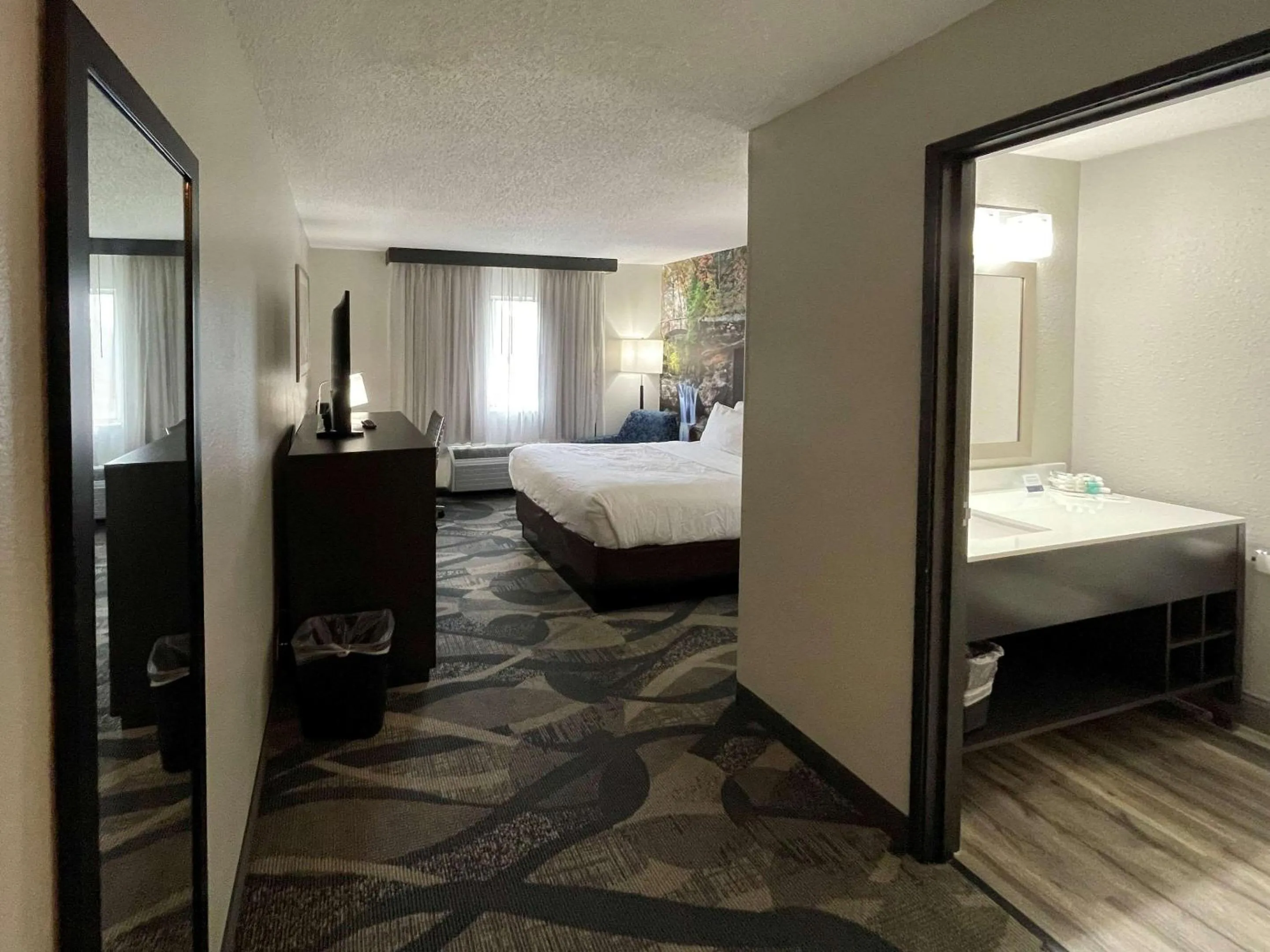 Photo of the whole room, Bed in Clarion Inn Fairborn - Dayton near Wright Patterson