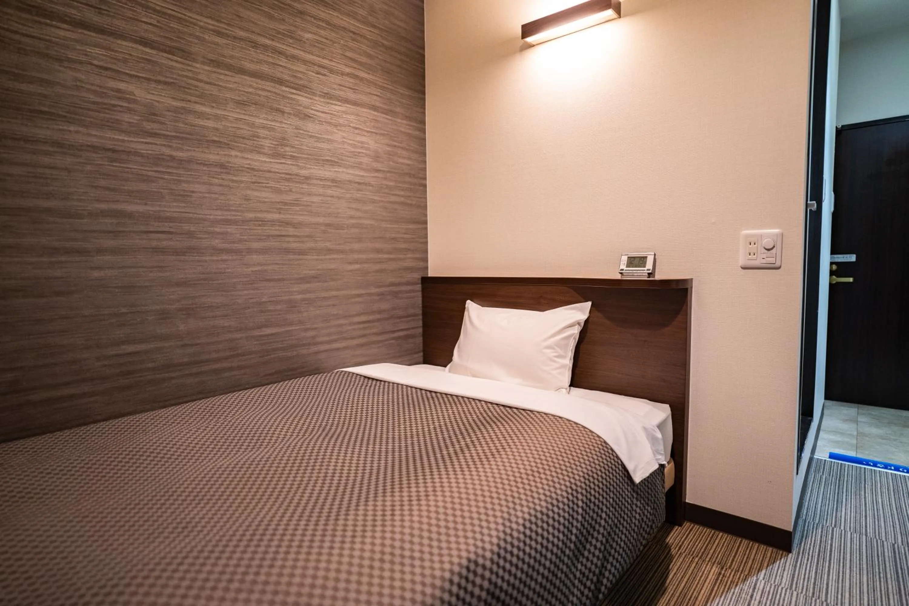 Photo of the whole room, Bed in Isahaya Daiichi Hotel