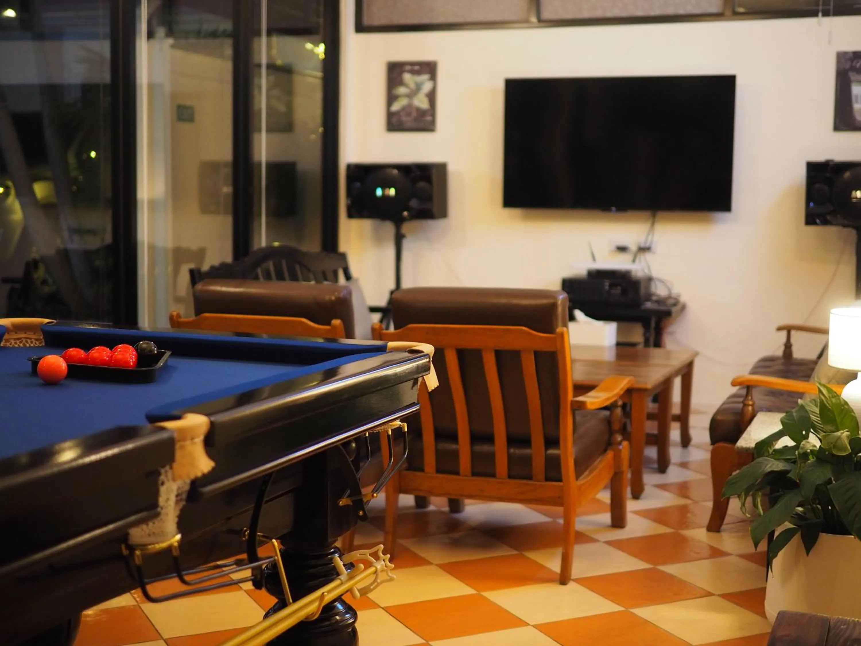 Communal lounge/ TV room in Mangoes Pattaya