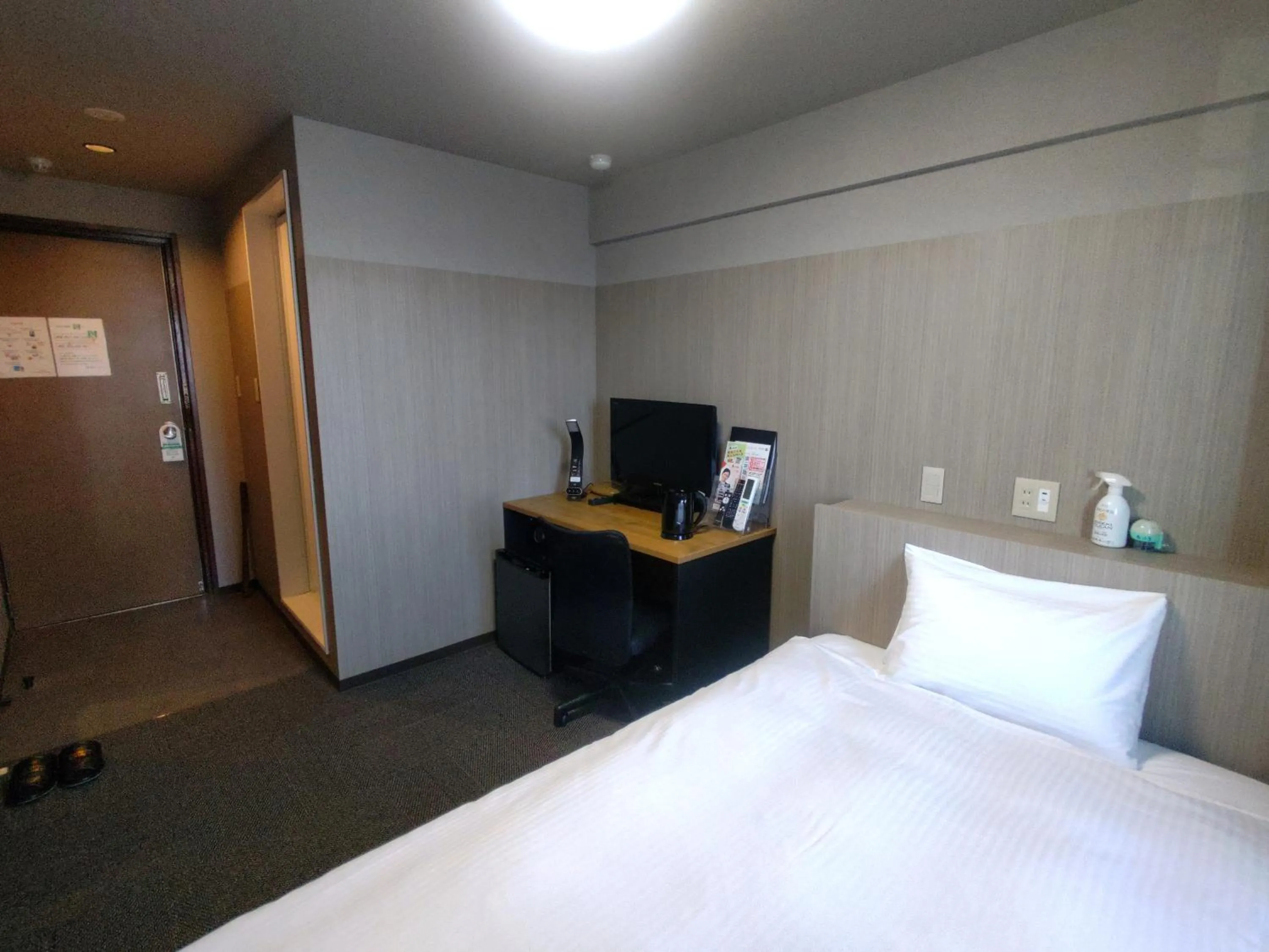 Bed in Handa Station Hotel