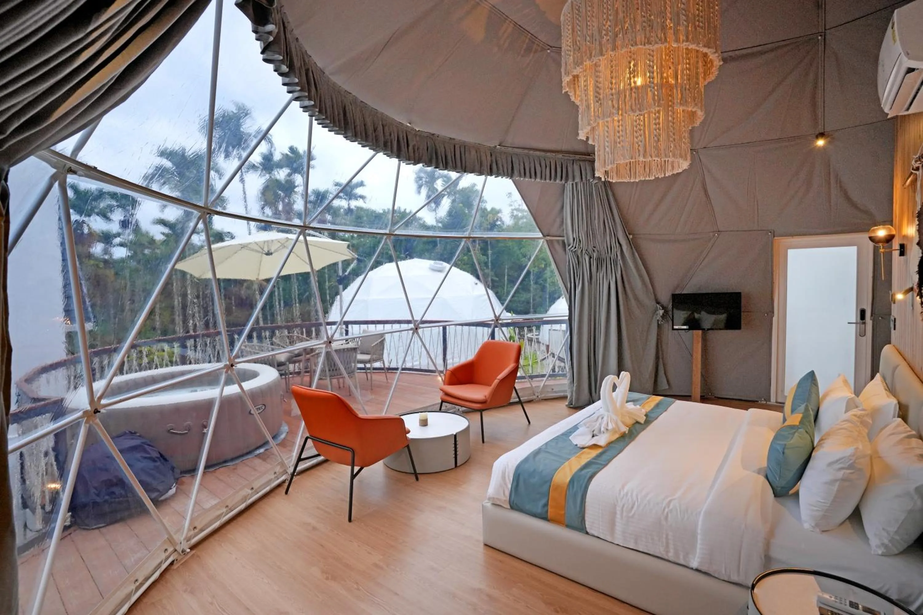 Bed in Le Villagio Resort & Domes