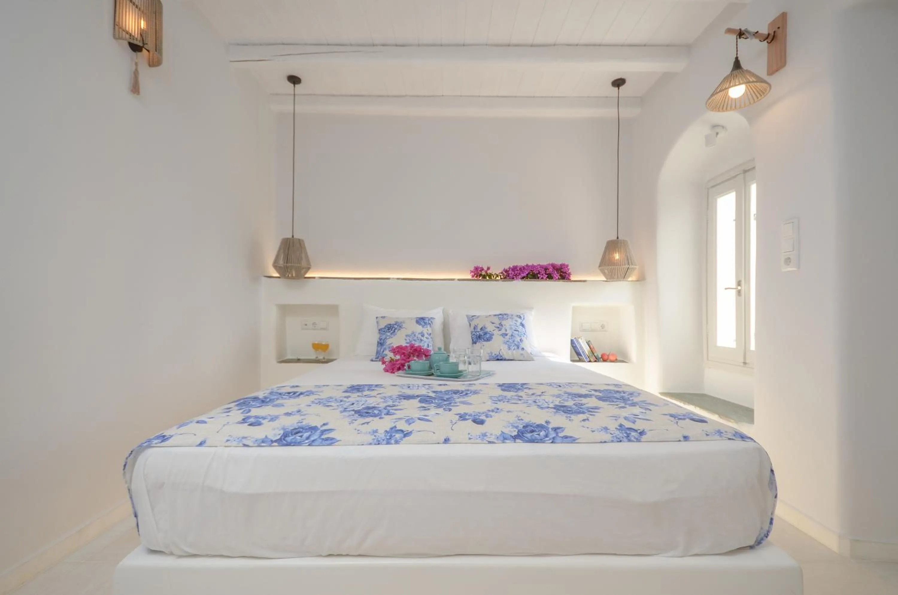 Bed in Naxian Queen Luxury Villas & Suites