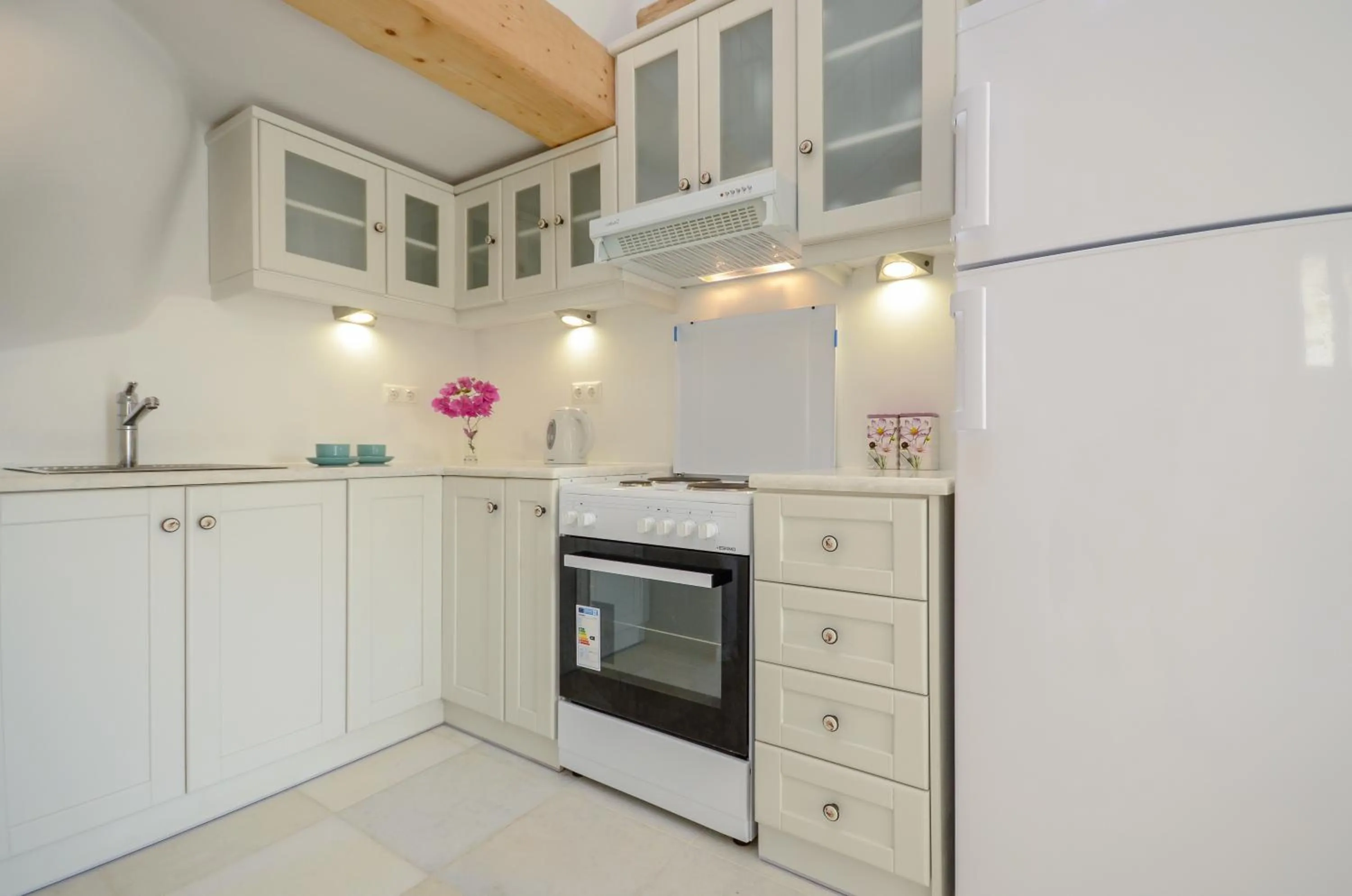 Kitchen or kitchenette in Naxian Queen Luxury Villas & Suites