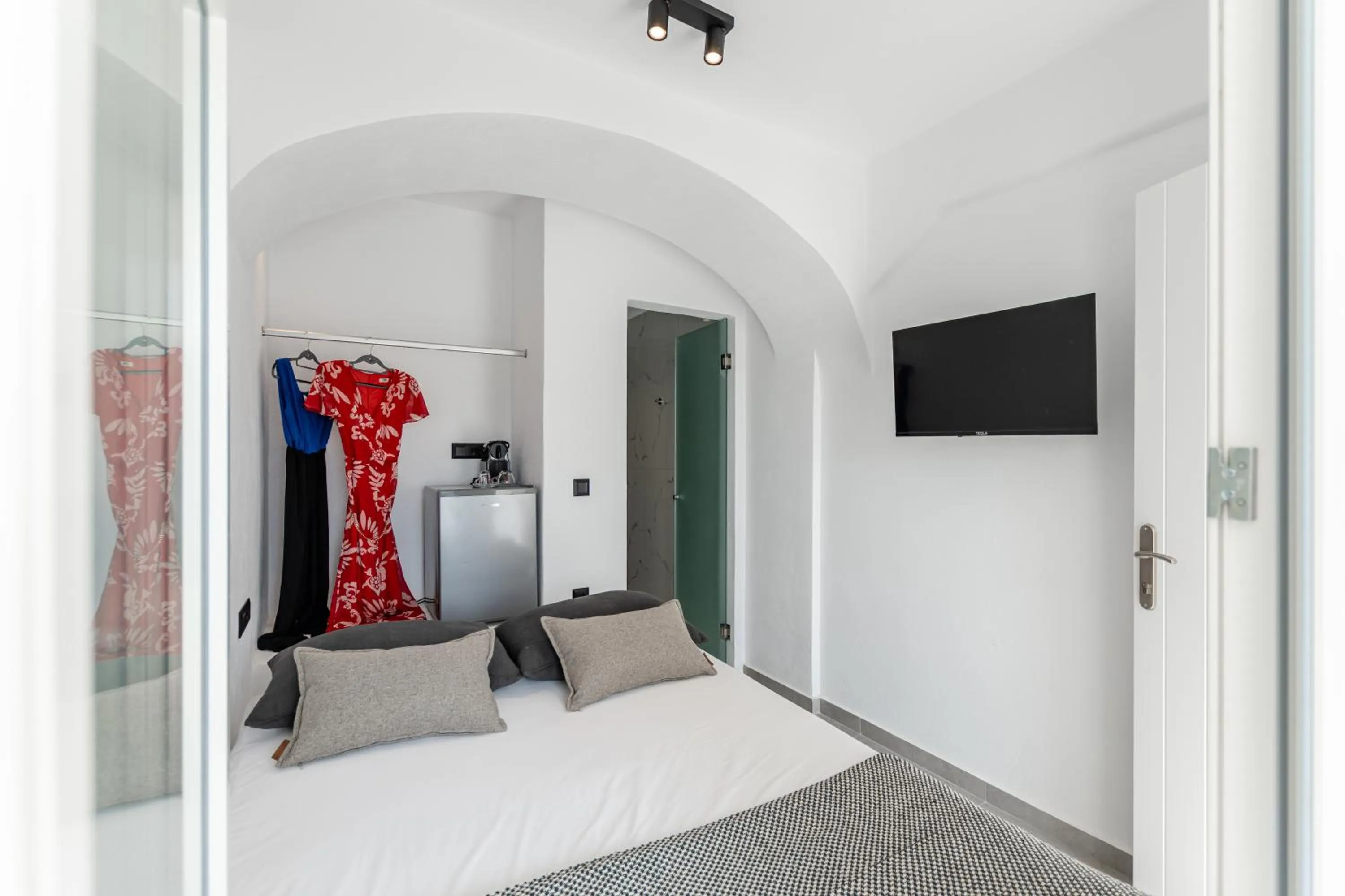 Bed in Naxian Queen Luxury Villas & Suites