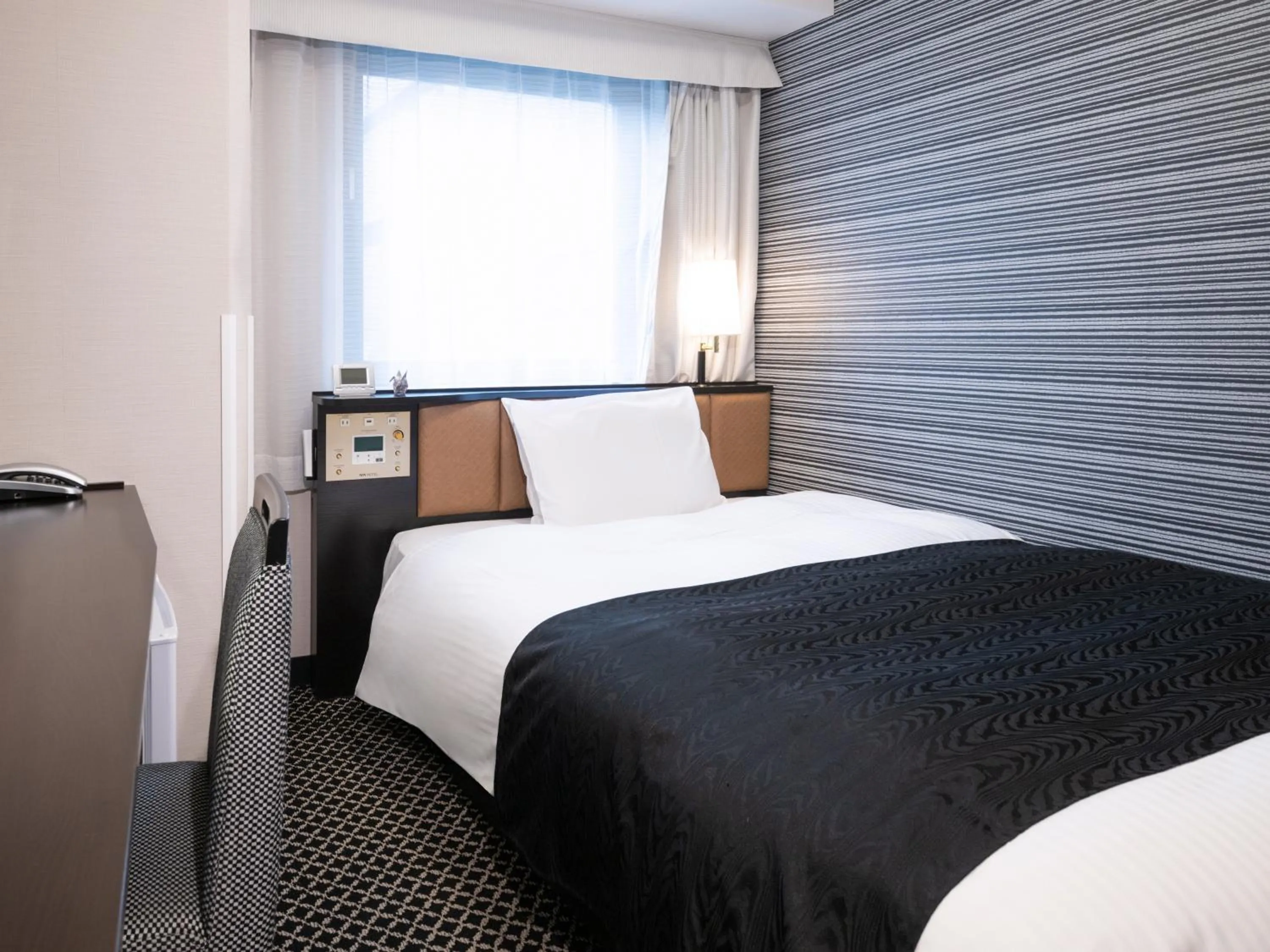 Photo of the whole room, Bed in APA Hotel Ginza Shintomicho Ekimae Kita