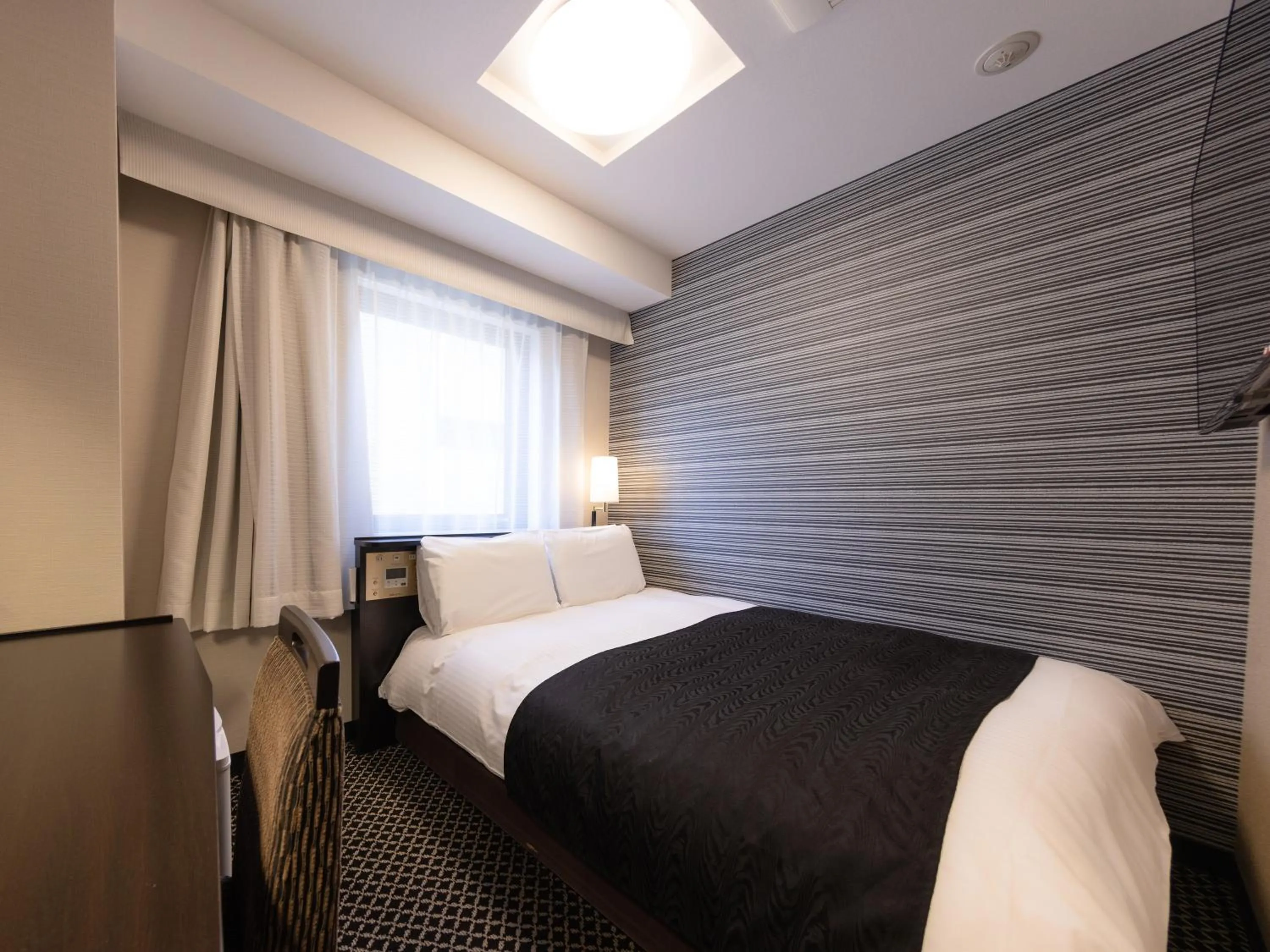 Photo of the whole room, Bed in APA Hotel Ginza Shintomicho Ekimae Kita