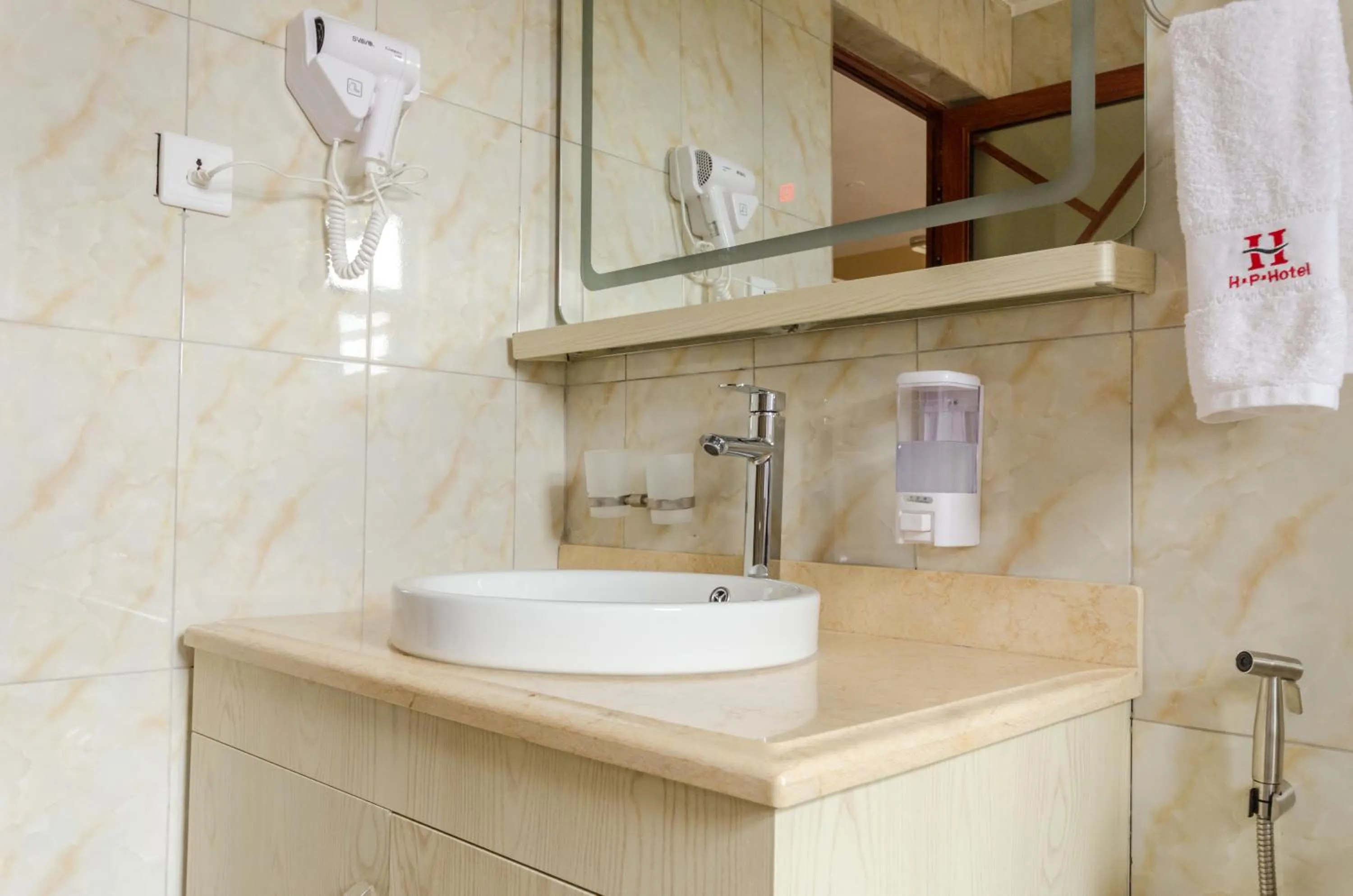 Bathroom in Hillside Plaza Hotel