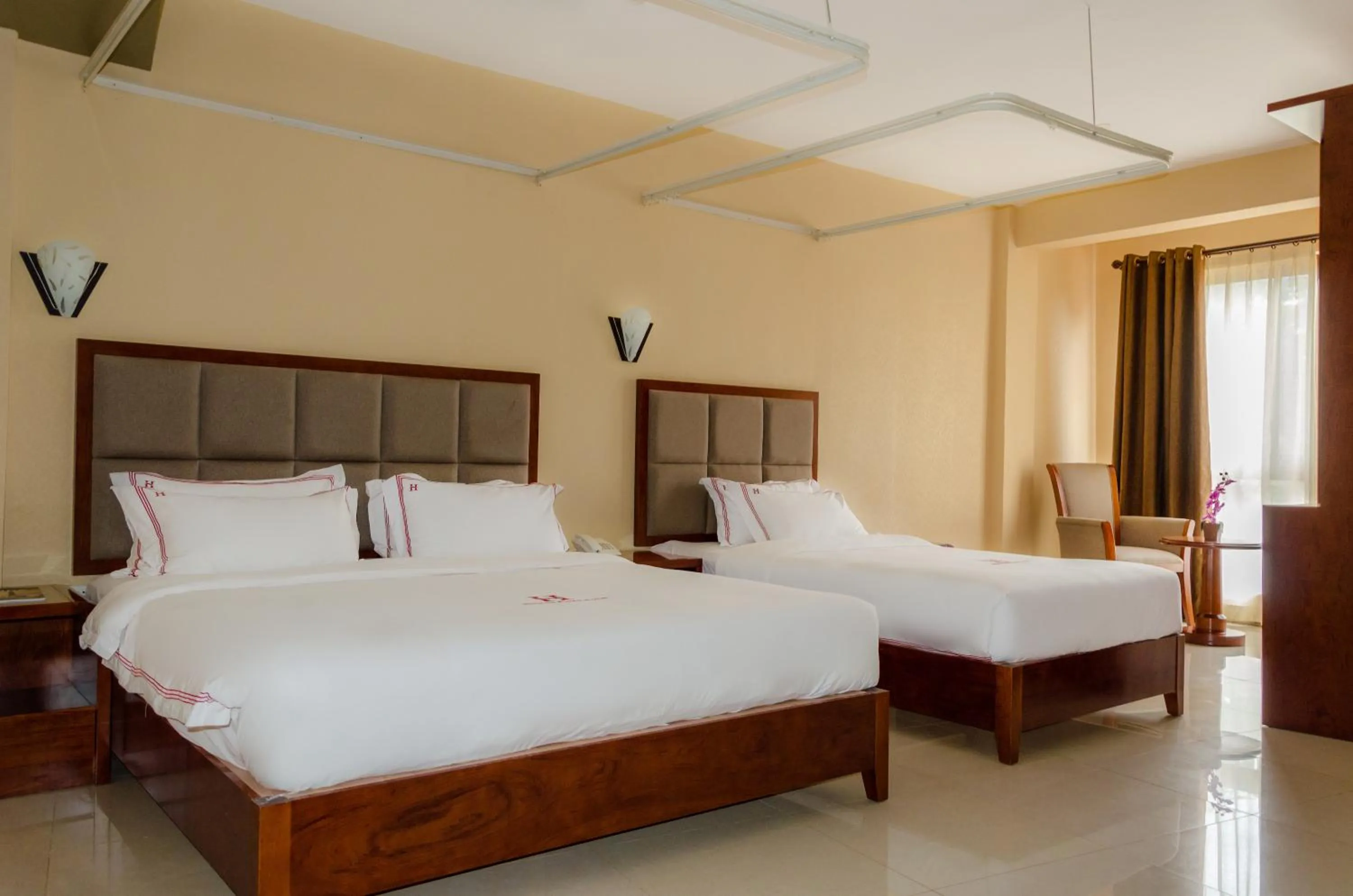 Bedroom in Hillside Plaza Hotel