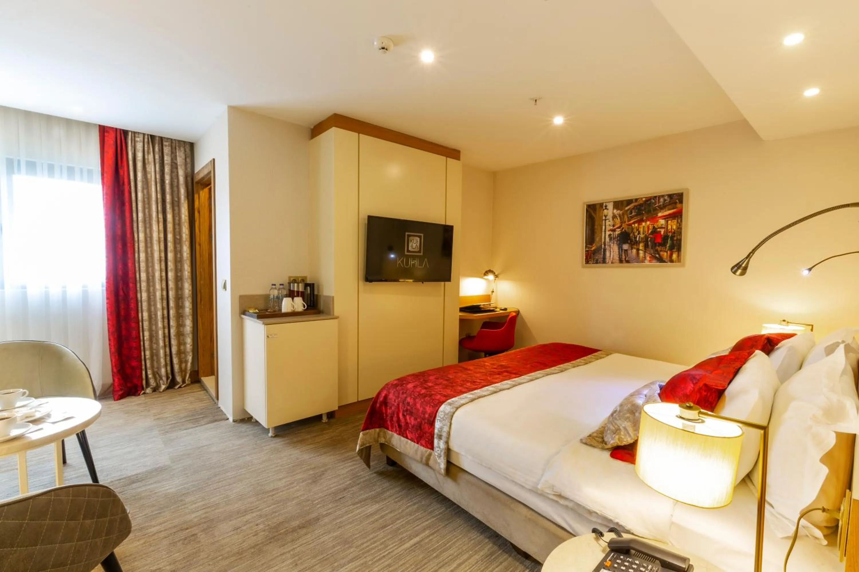 TV and multimedia, Bed in Kuhla Hotel