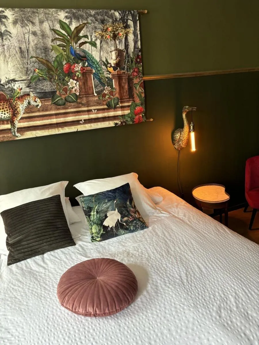 Photo of the whole room, Bed in Hôtel Le Tiburon