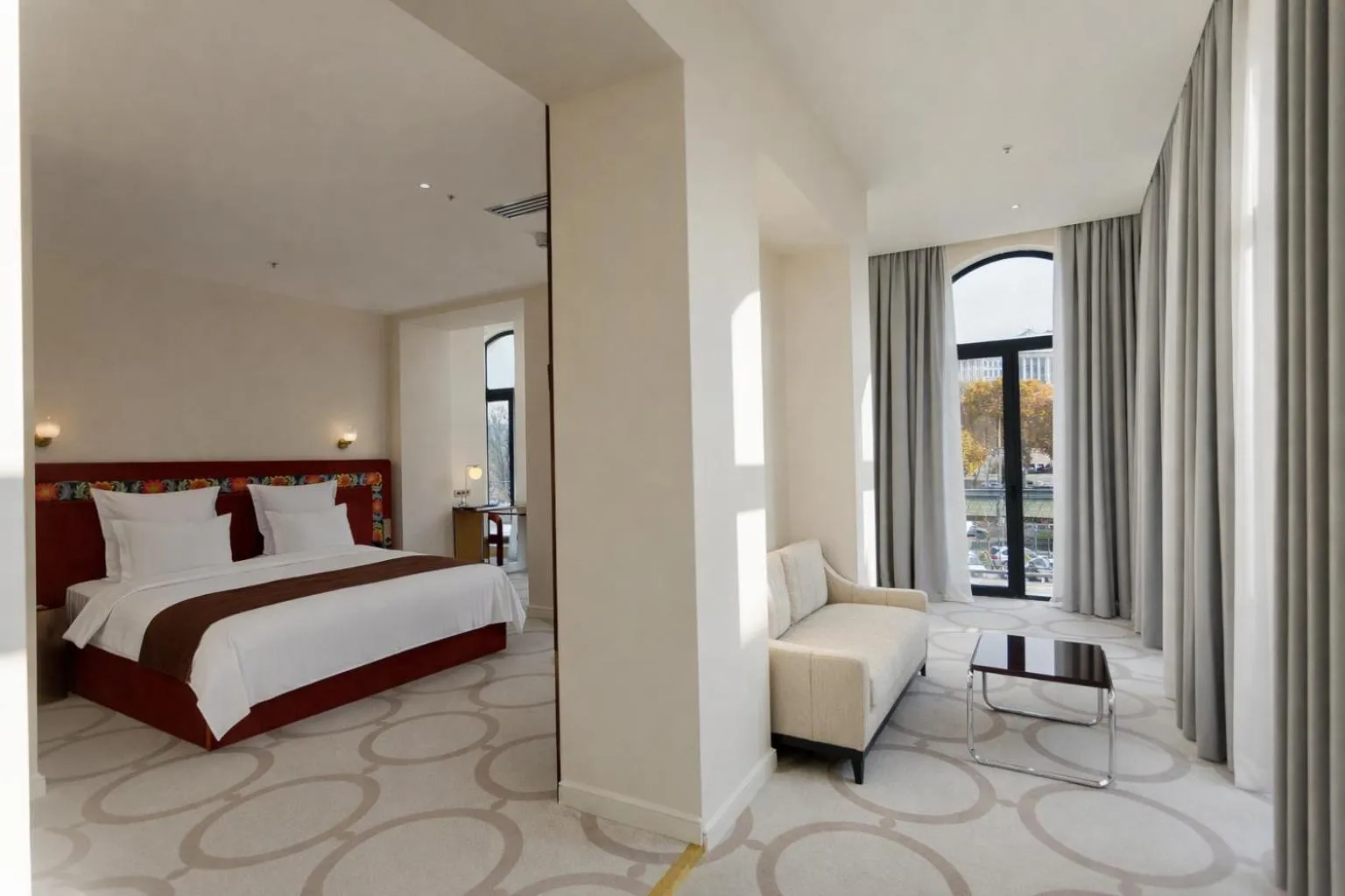 Bed in Ambassadori Tbilisi Hotel