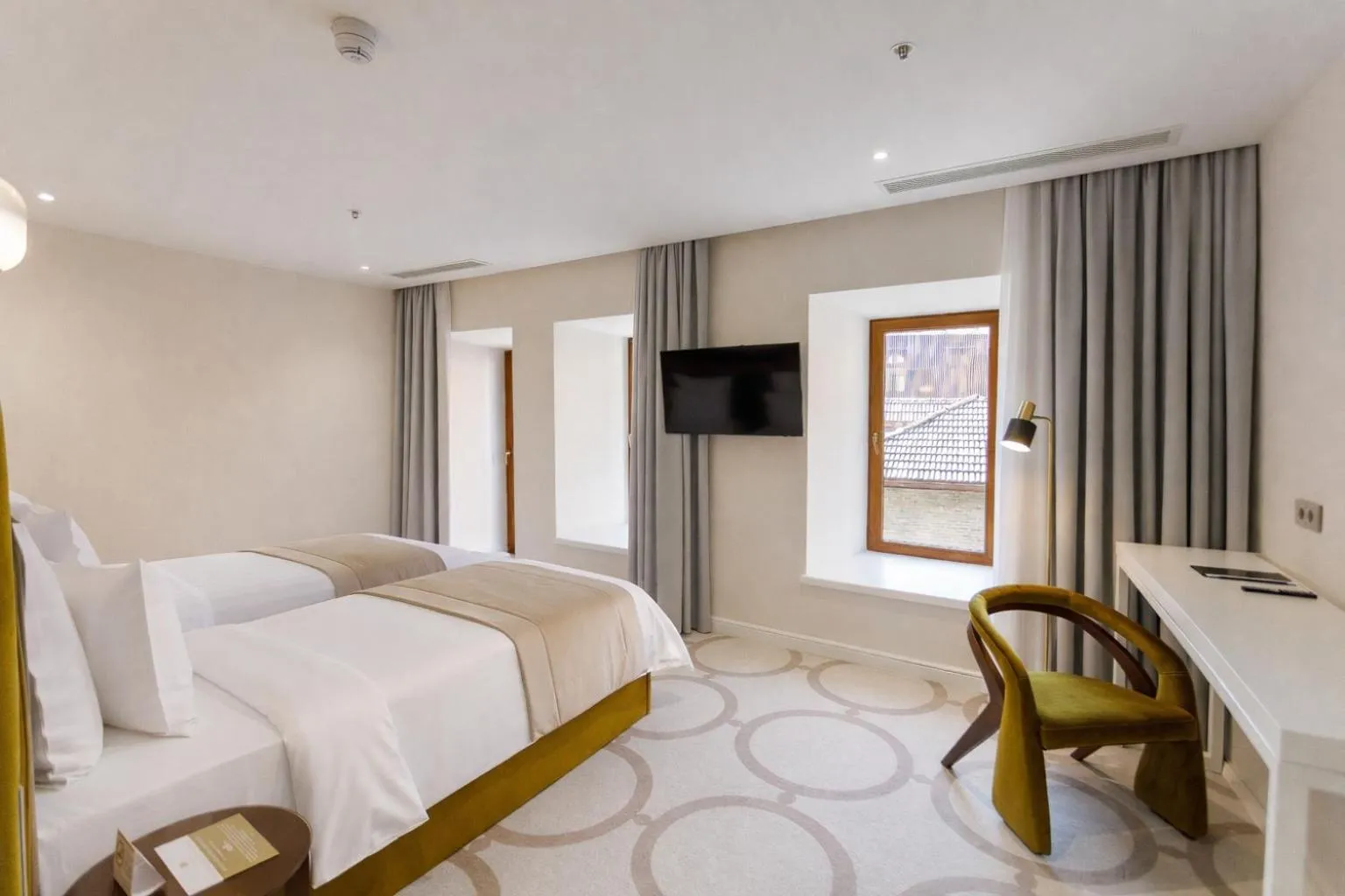 Bed in Ambassadori Tbilisi Hotel