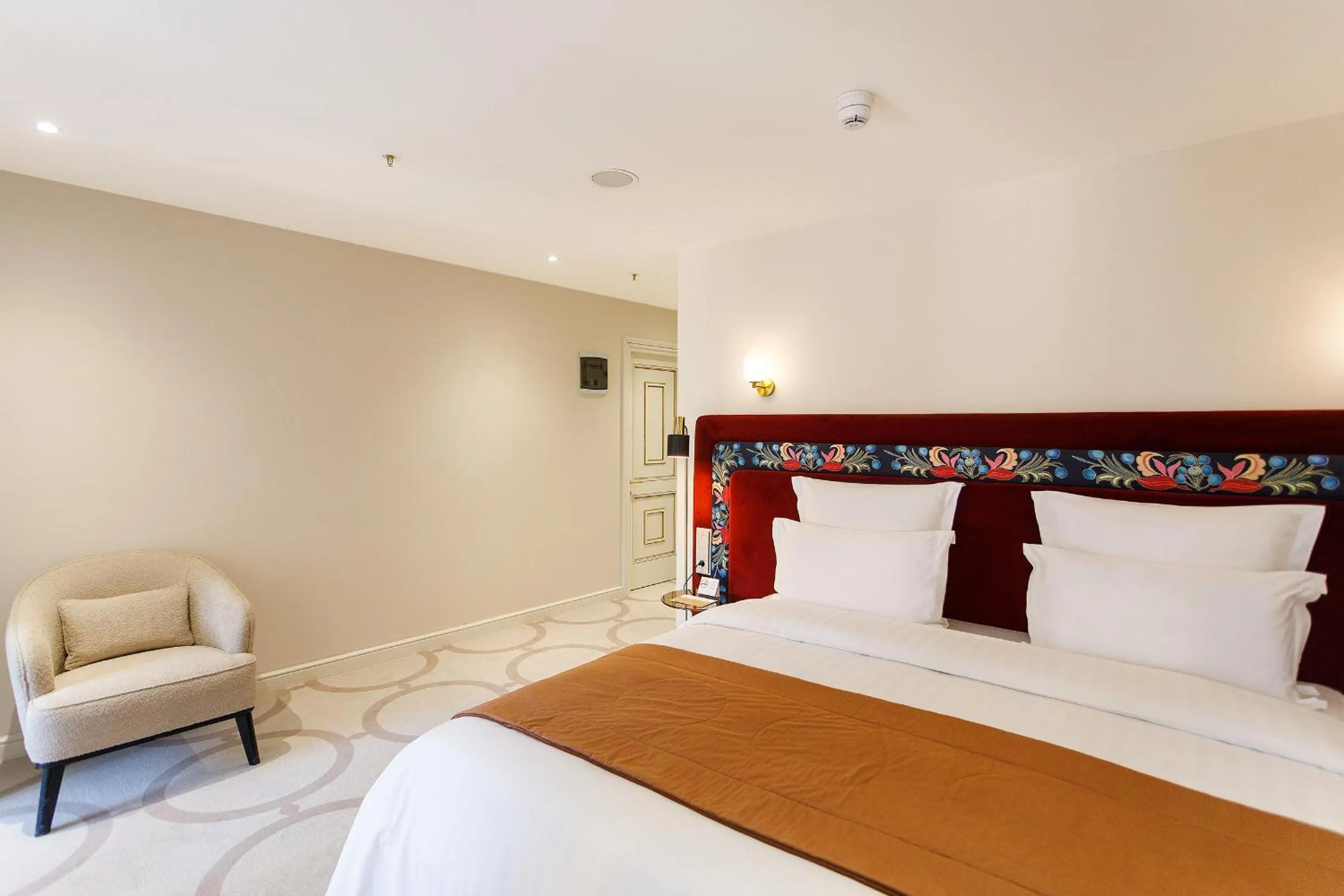 Bed in Ambassadori Tbilisi Hotel