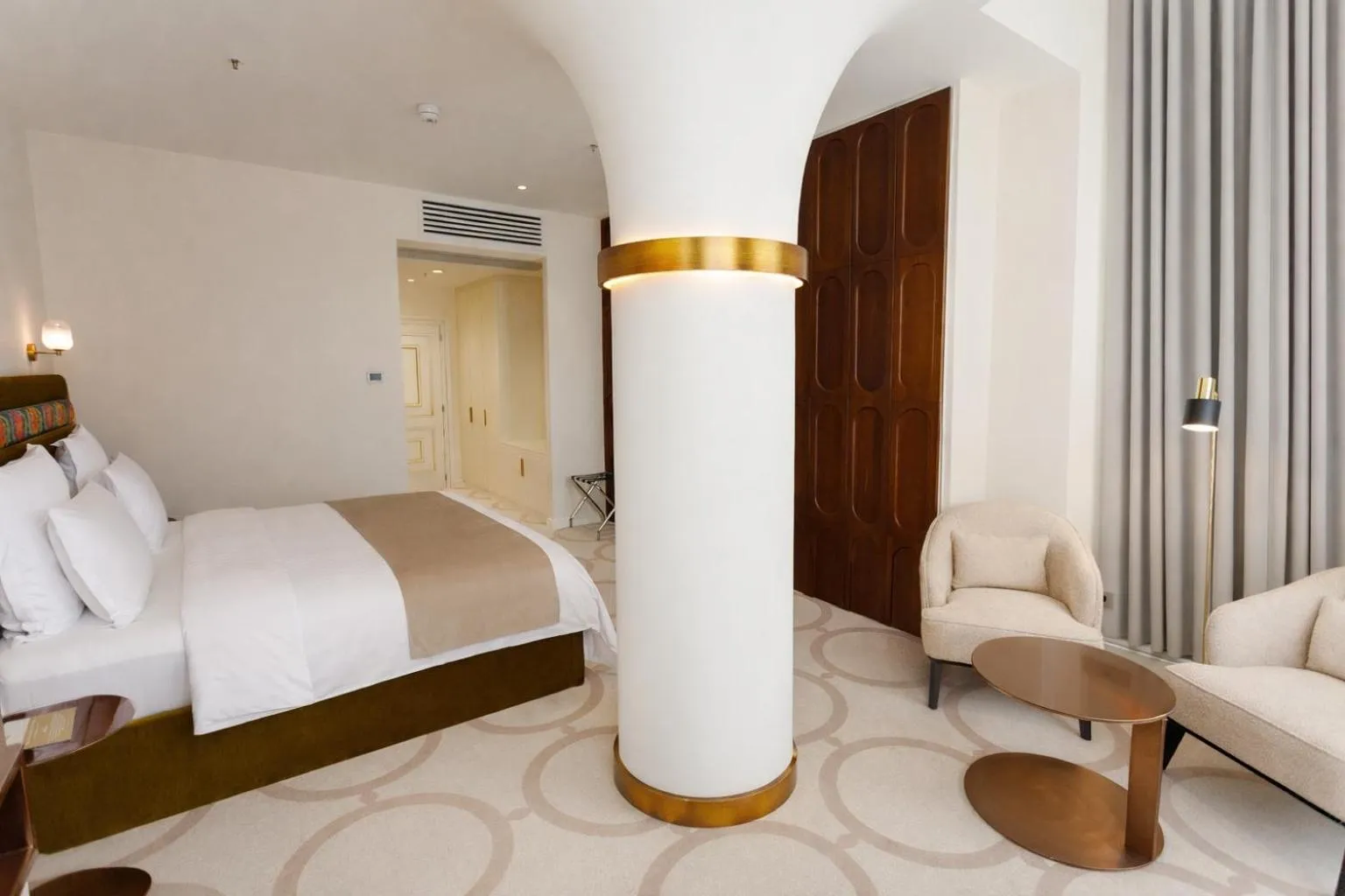 Bed in Ambassadori Tbilisi Hotel